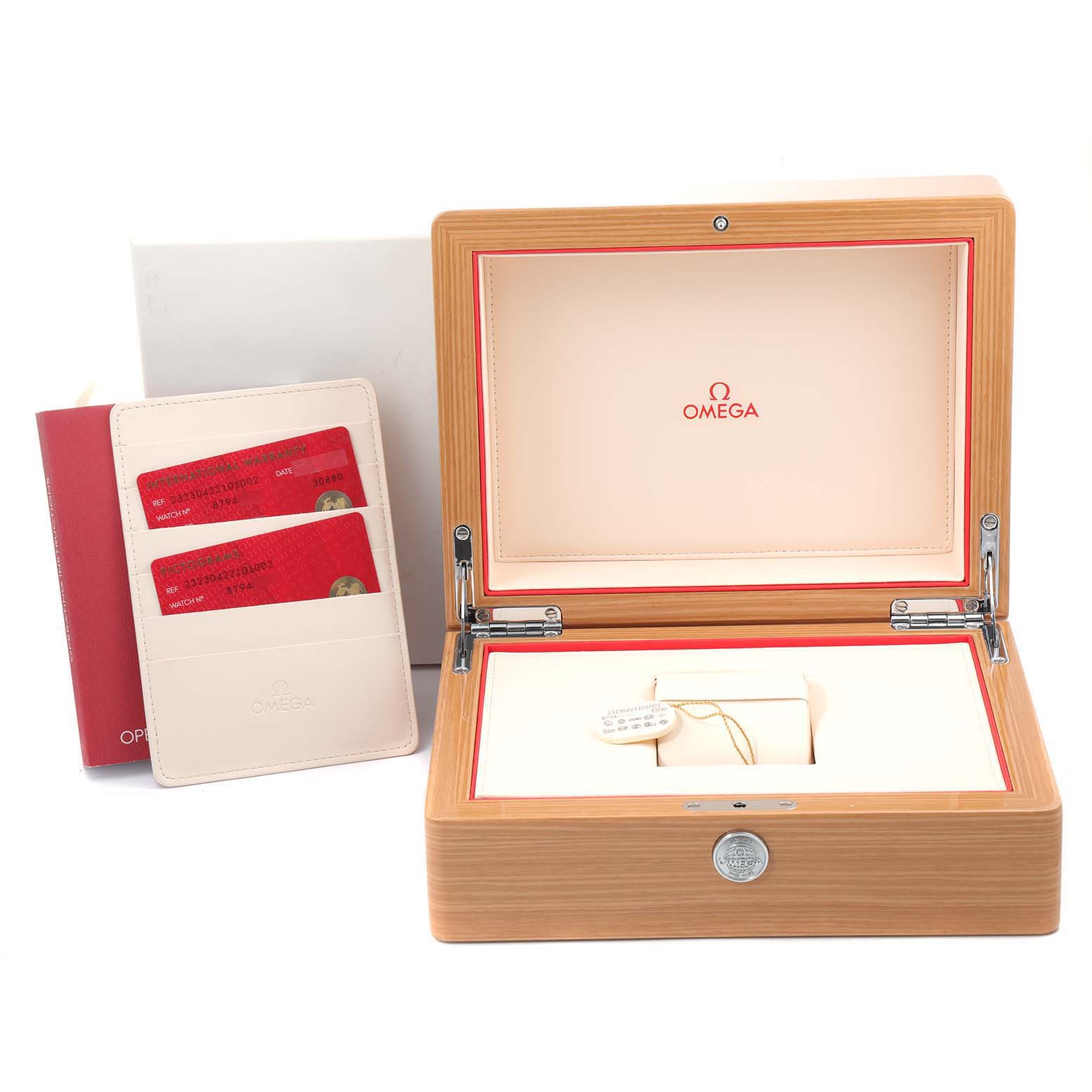 The image shows the open box, warranty cards, and accessories for the Omega Planet Ocean 232.30.42.21.01.002 Men
s Stainless Steel Black Dial 232.30.42.21.01.002 Men
s Stainless Steel Black Dial model.