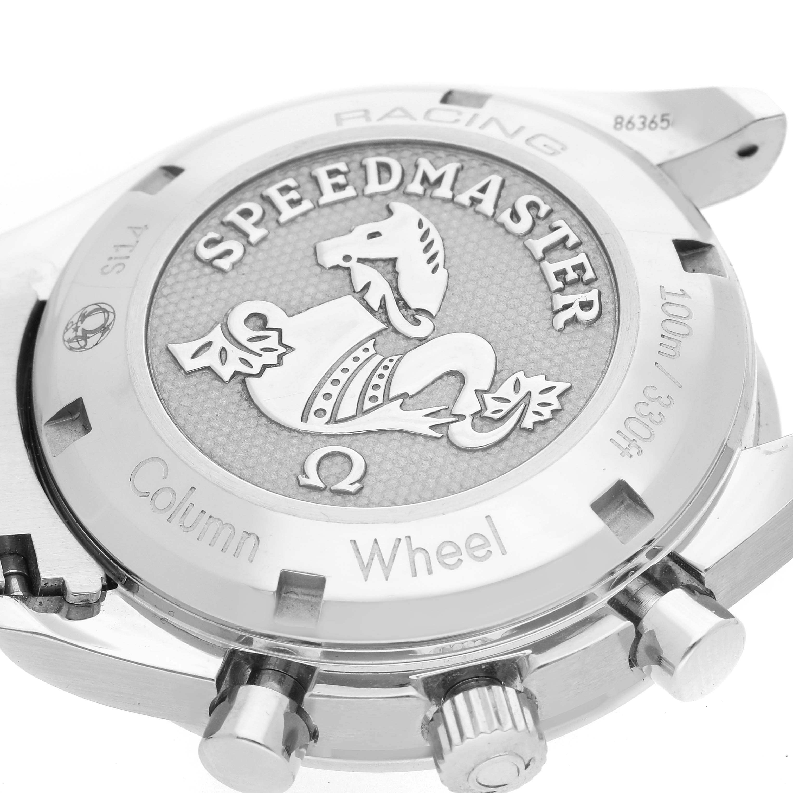 The image shows the case back and side pushers of an Omega Speedmaster 326.30.40.50.11.001 Men's Stainless Steel Red Dial 326.30.40.50.11.001 Men's Stainless Steel Red Dial watch at an angled view.