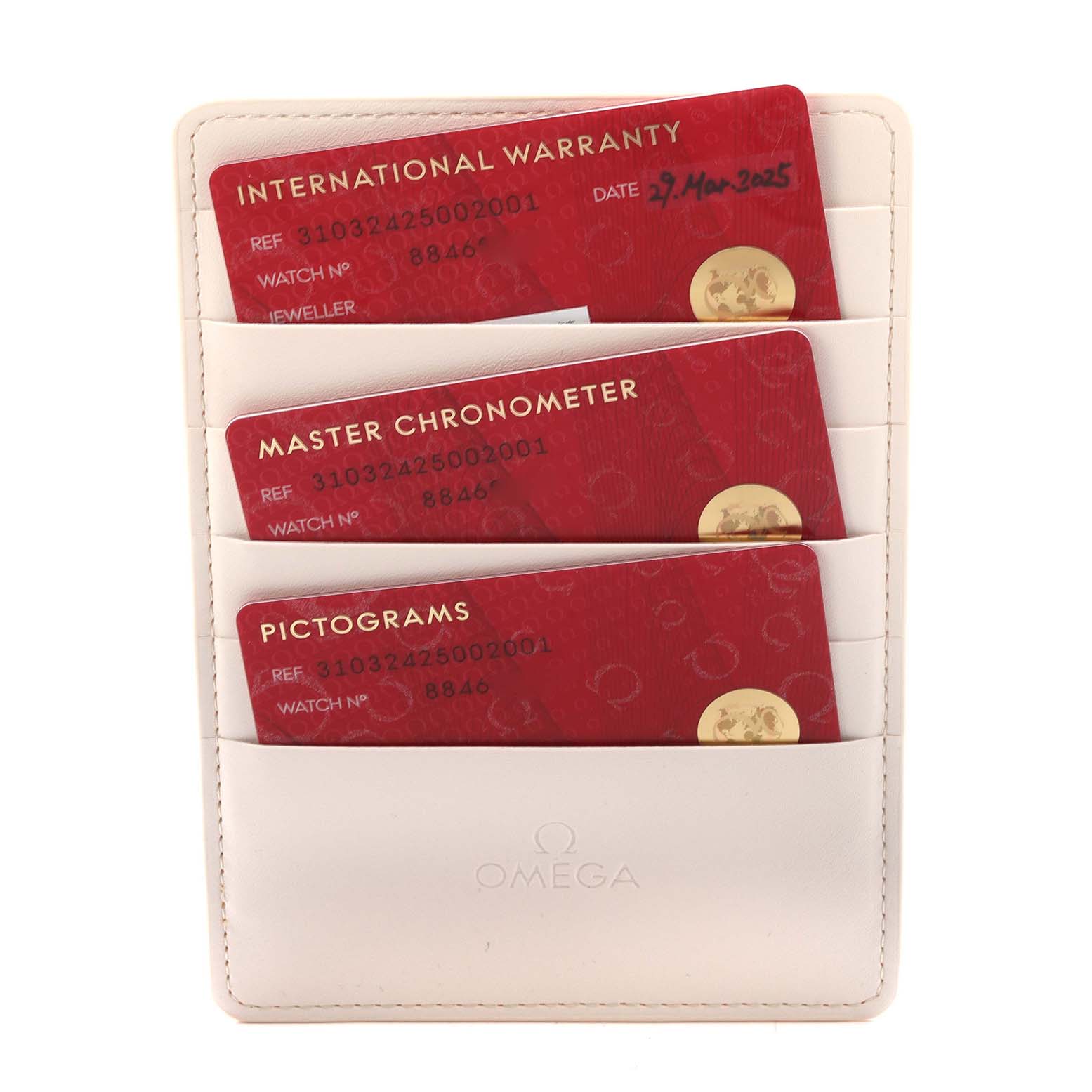 The image shows red documentation cards in a white Omega-branded holder for the Omega Speedmaster 310.32.42.50.02.001 Men's Stainless Steel Silver Dial 310.32.42.50.02.001 Men's Stainless Steel Silver Dial model.