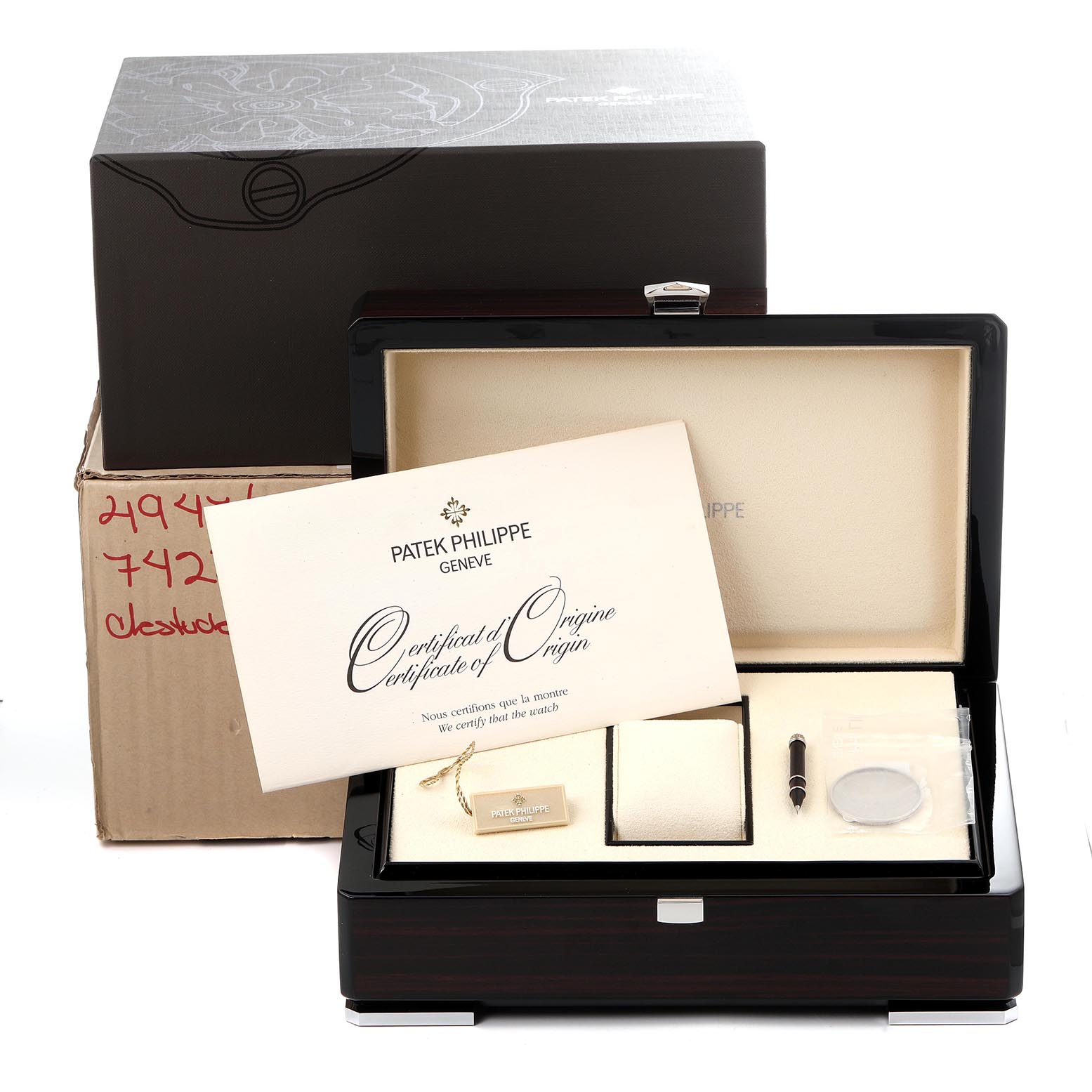 The image shows a Patek Philippe Complications 5140P-001 Men's Platinum Blue Dial 5140P-001 Men's Platinum Blue Dial watch box with accessories, certificate, stylus, and tag, viewed from the front.