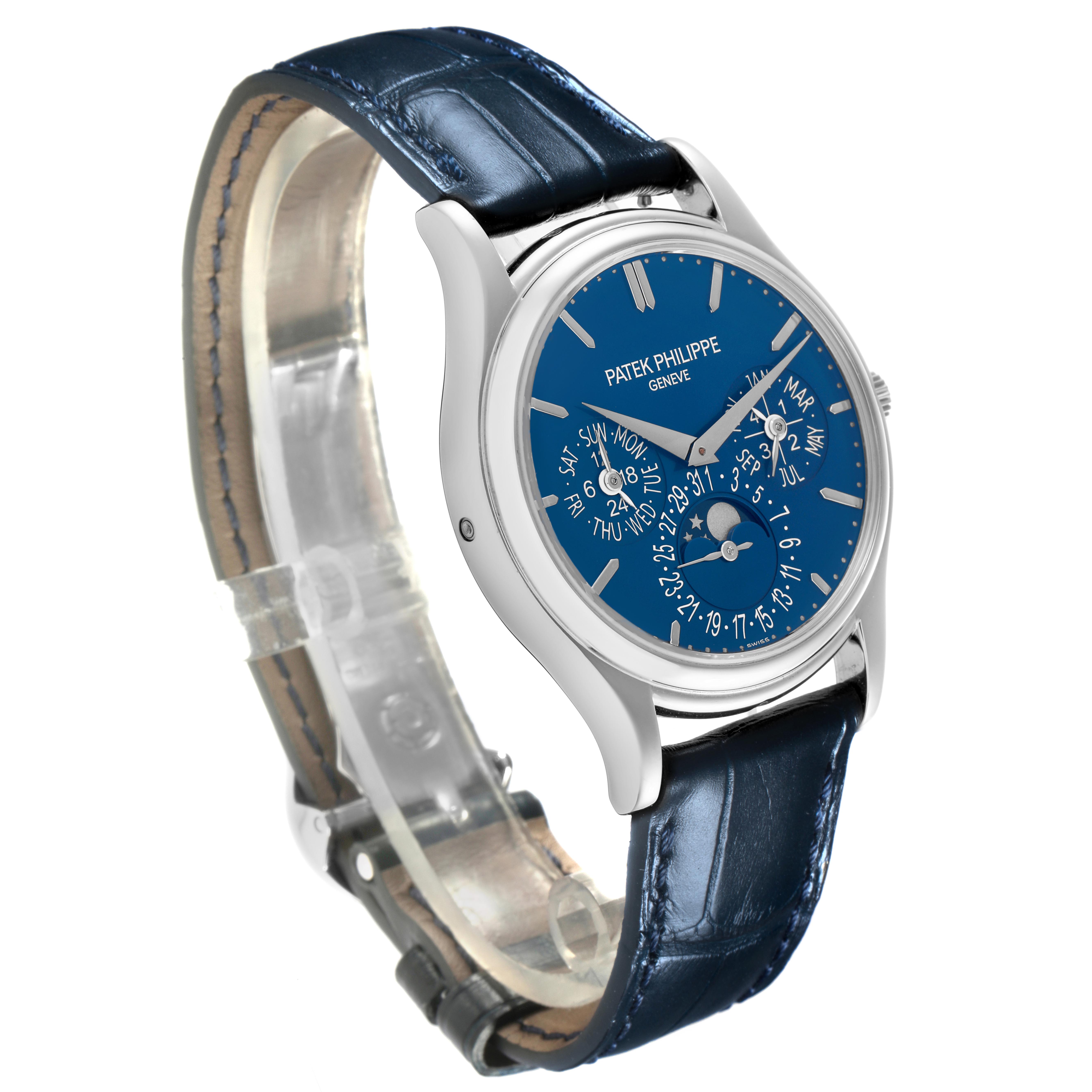 The Patek Philippe Complications 5140P-001 Men's Platinum Blue Dial 5140P-001 Men's Platinum Blue Dial model is shown at a three-quarter angle, highlighting the blue dial and leather strap.
