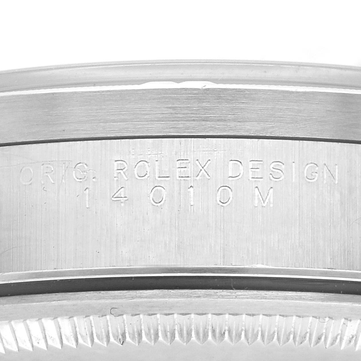 The image shows a close-up of the side of a Rolex Air-King 14010 Men's Stainless Steel Blue Dial 14010 Men's Stainless Steel Blue Dial watch, highlighting the engraved model details.
