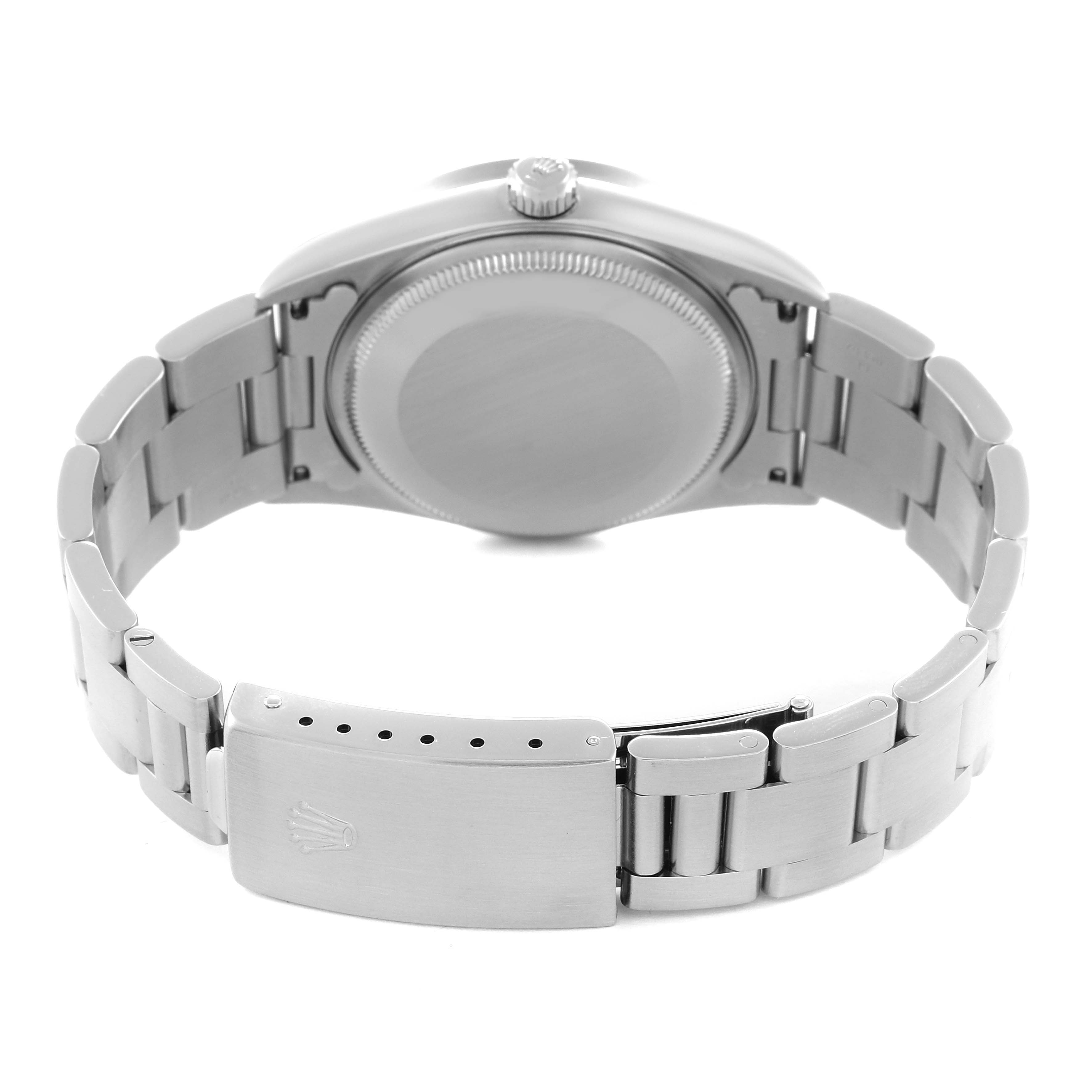 The image shows the back of a Rolex Air-King 14010 Men's Stainless Steel Blue Dial 14010 Men's Stainless Steel Blue Dial watch, highlighting the case back, bracelet, and clasp.