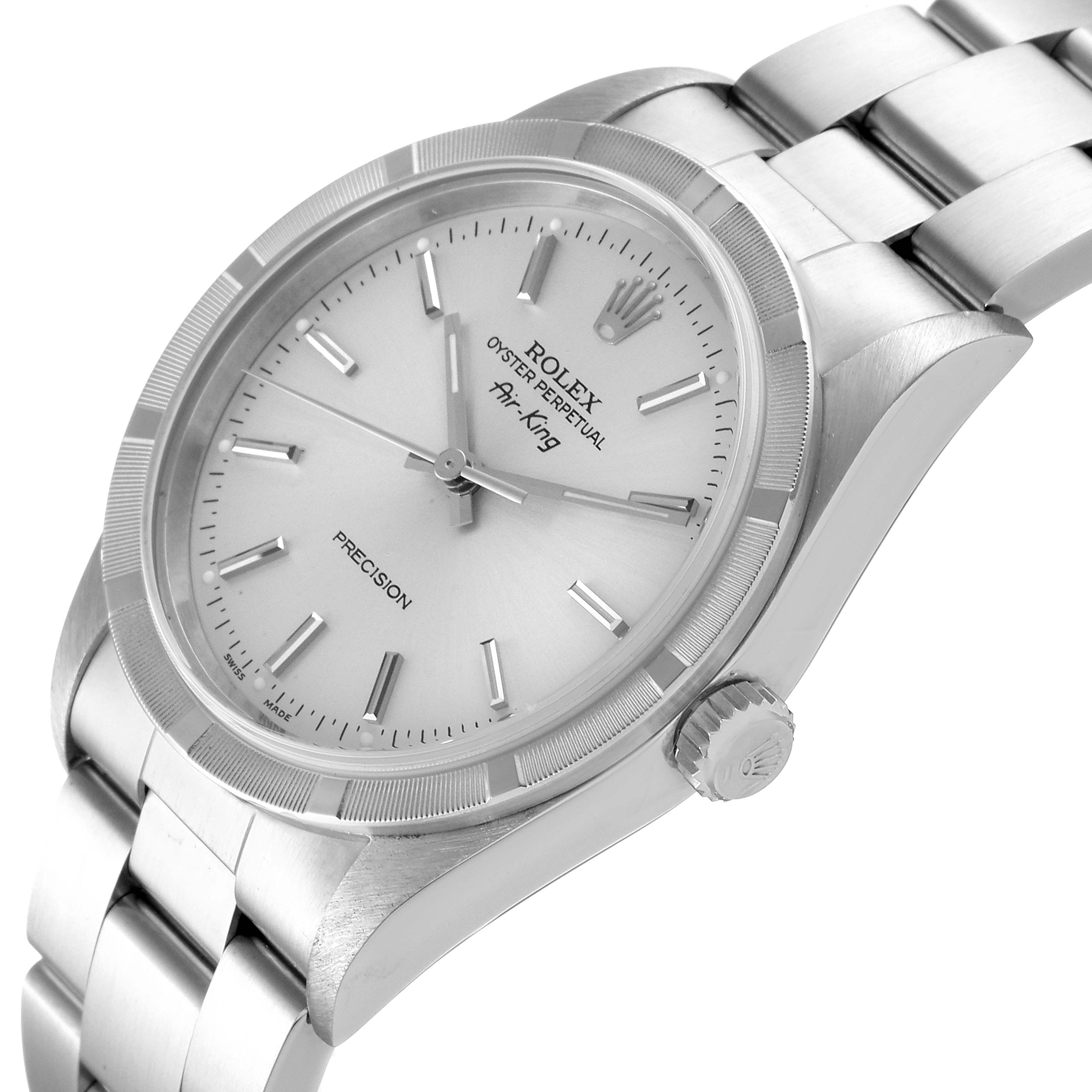 This image displays a side angle of a Rolex Air-King 14010 Men's Stainless Steel Silver Dial 14010 Men's Stainless Steel Silver Dial watch, showcasing its face, bezel, crown, and part of the bracelet.