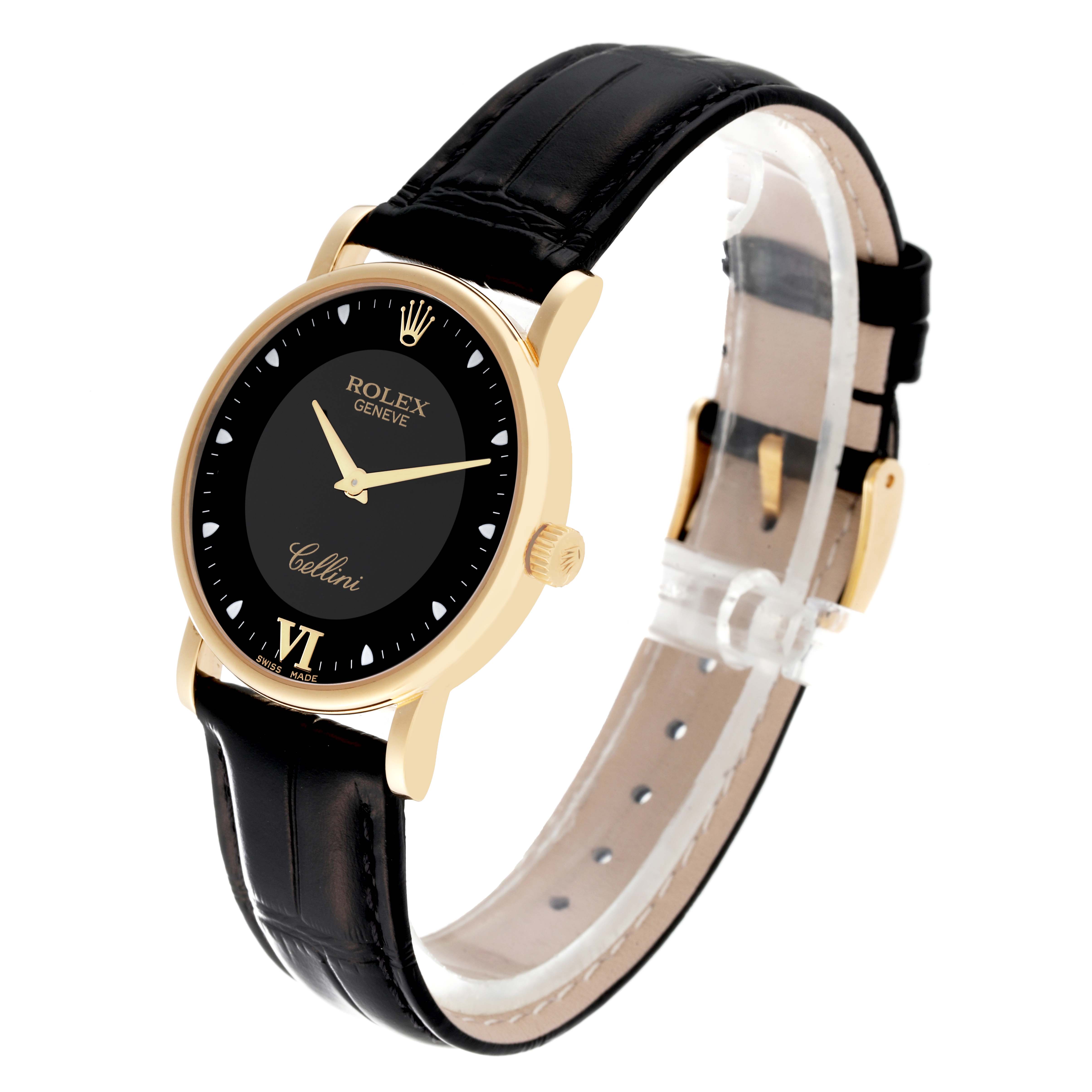 The Rolex Cellini 5115 Men's Yellow Gold Black Dial 5115 Men's Yellow Gold Black Dial watch is shown at an angle highlighting its black dial, gold case, and black leather strap.