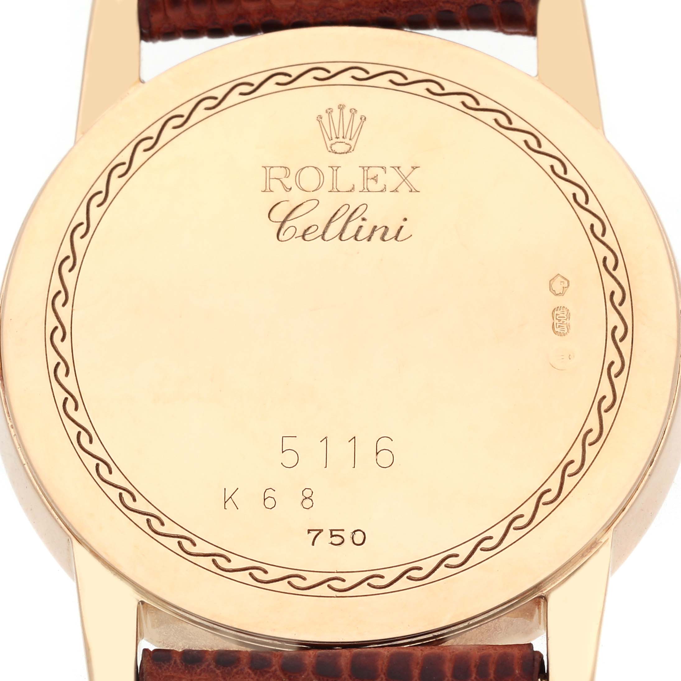 The image shows the back of a Rolex Cellini 5116/8 Men's Yellow Gold Silver Dial 5116/8 Men's Yellow Gold Silver Dial watch, displaying the engravings and brown leather strap attachment.