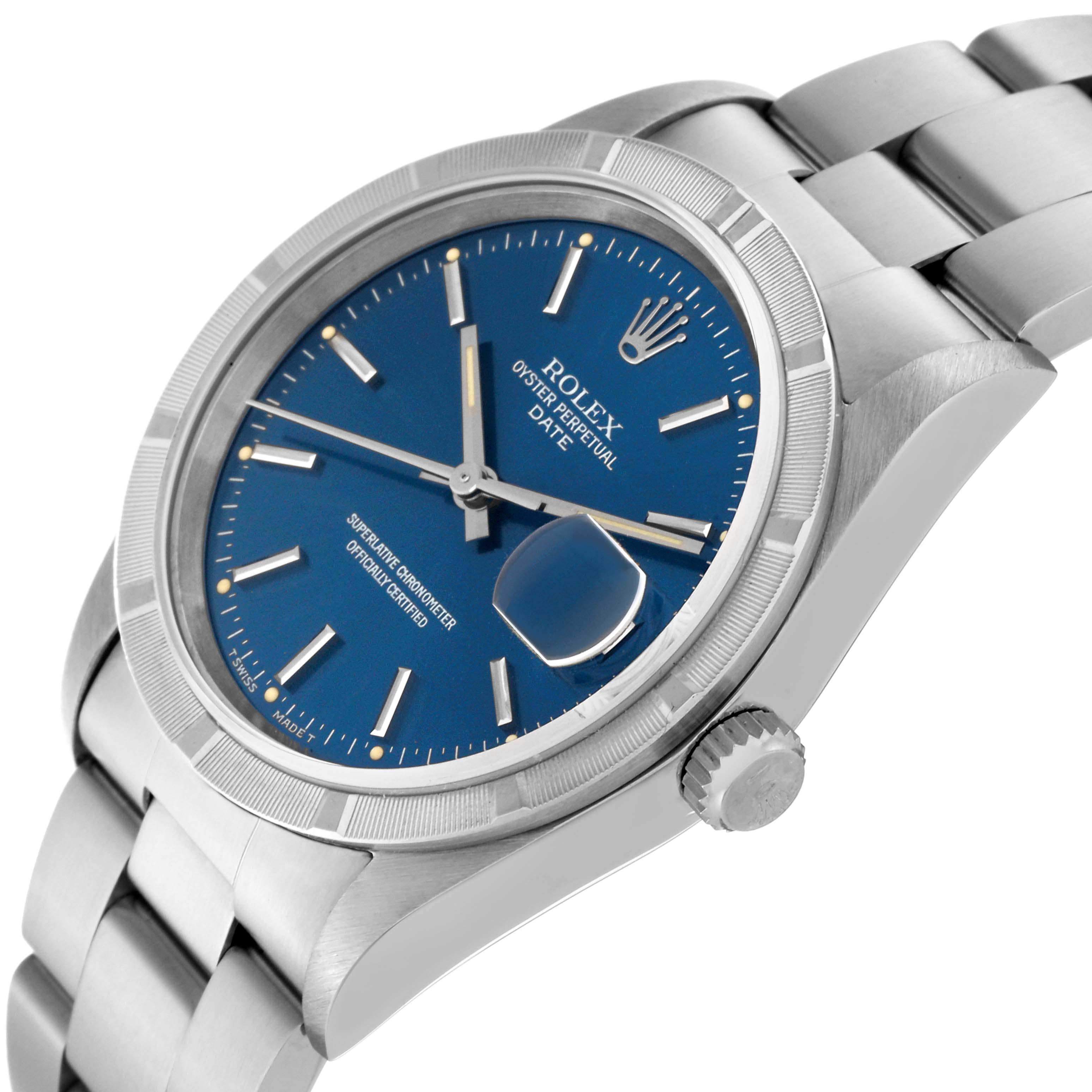 The image shows a Rolex Date 15210 Men's Stainless Steel Blue Dial 15210 Men's Stainless Steel Blue Dial model watch from a three-quarter angle, highlighting the blue dial, bezel, crown, and bracelet.