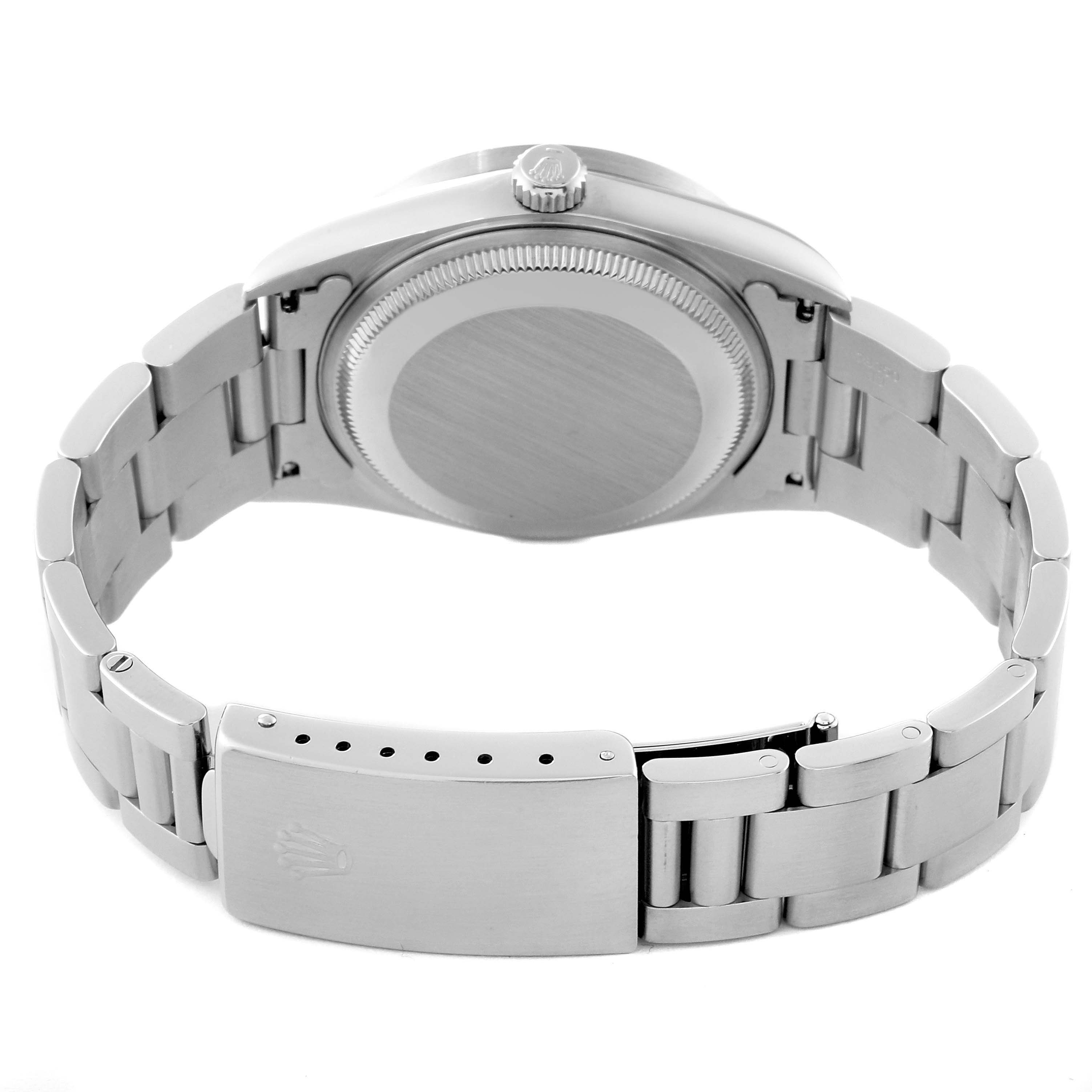 The image shows the back and clasp of a Rolex Date 15210 Men's Stainless Steel Blue Dial 15210 Men's Stainless Steel Blue Dial model watch, highlighting the bracelet and case back.