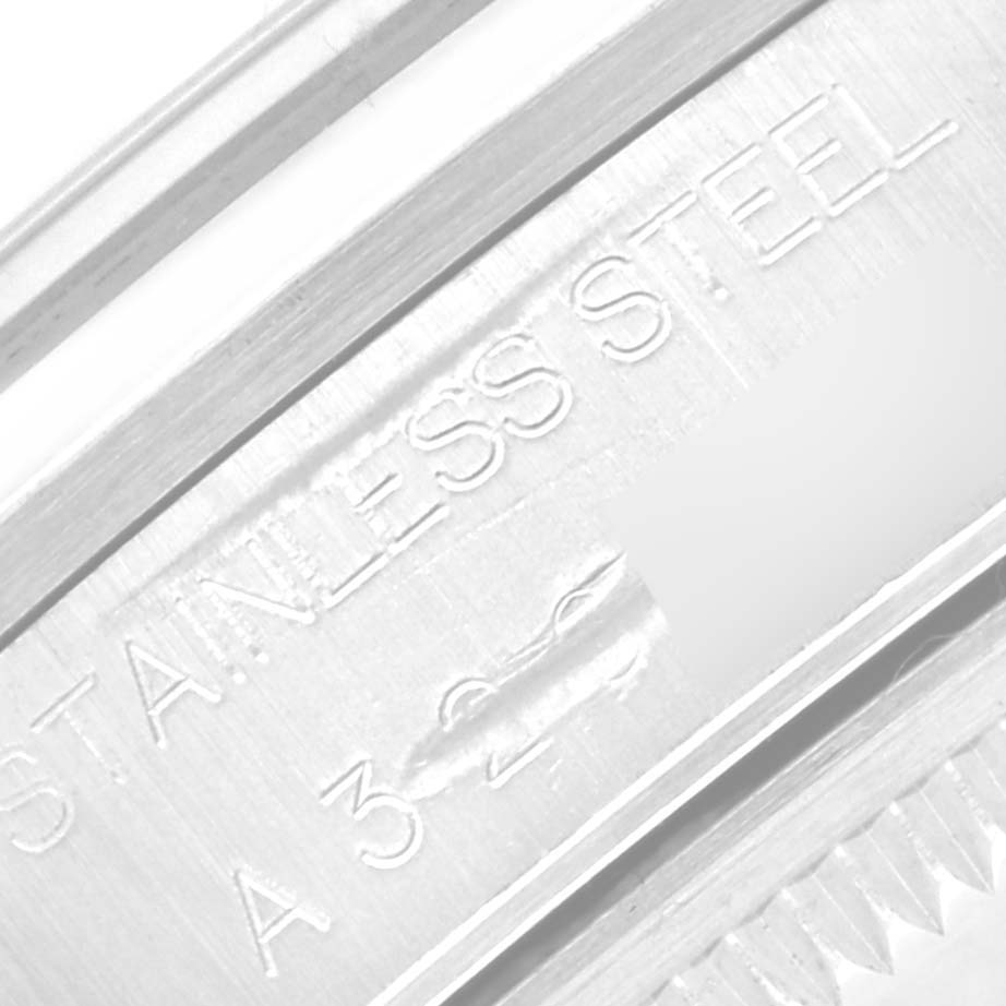 This close-up image shows the side of the case and engraved serial number of a Rolex Date 15200 Men's Stainless Steel Blue Dial 15200 Men's Stainless Steel Blue Dial model watch.