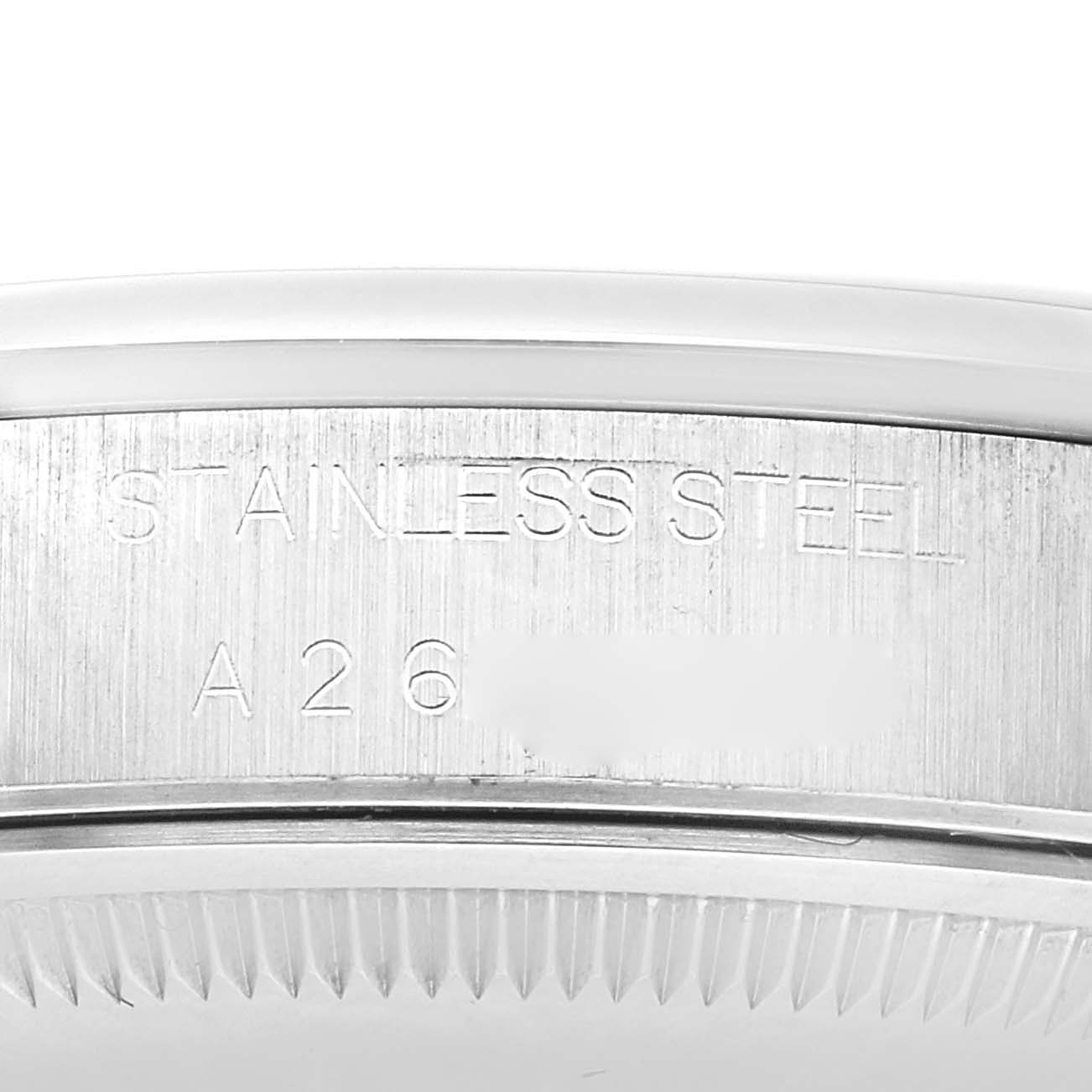 The image shows the side view of a Rolex Date 15200 Men's Stainless Steel Pink Dial 15200 Men's Stainless Steel Pink Dial watch, highlighting the stainless steel case with engravings.