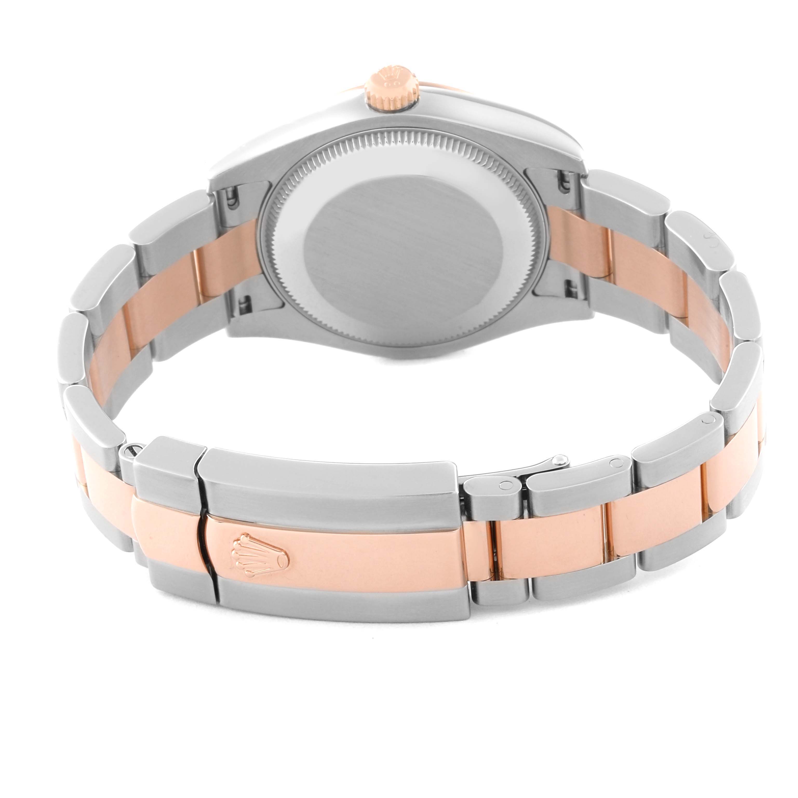 This image shows the back case and closed clasp of the Rolex Mid-Size 178241 Women's Steel and Gold (two tone) Pink Dial 178241 Women's Steel and Gold (two tone) Pink Dial watch, highlighting its two-tone metal bracelet.