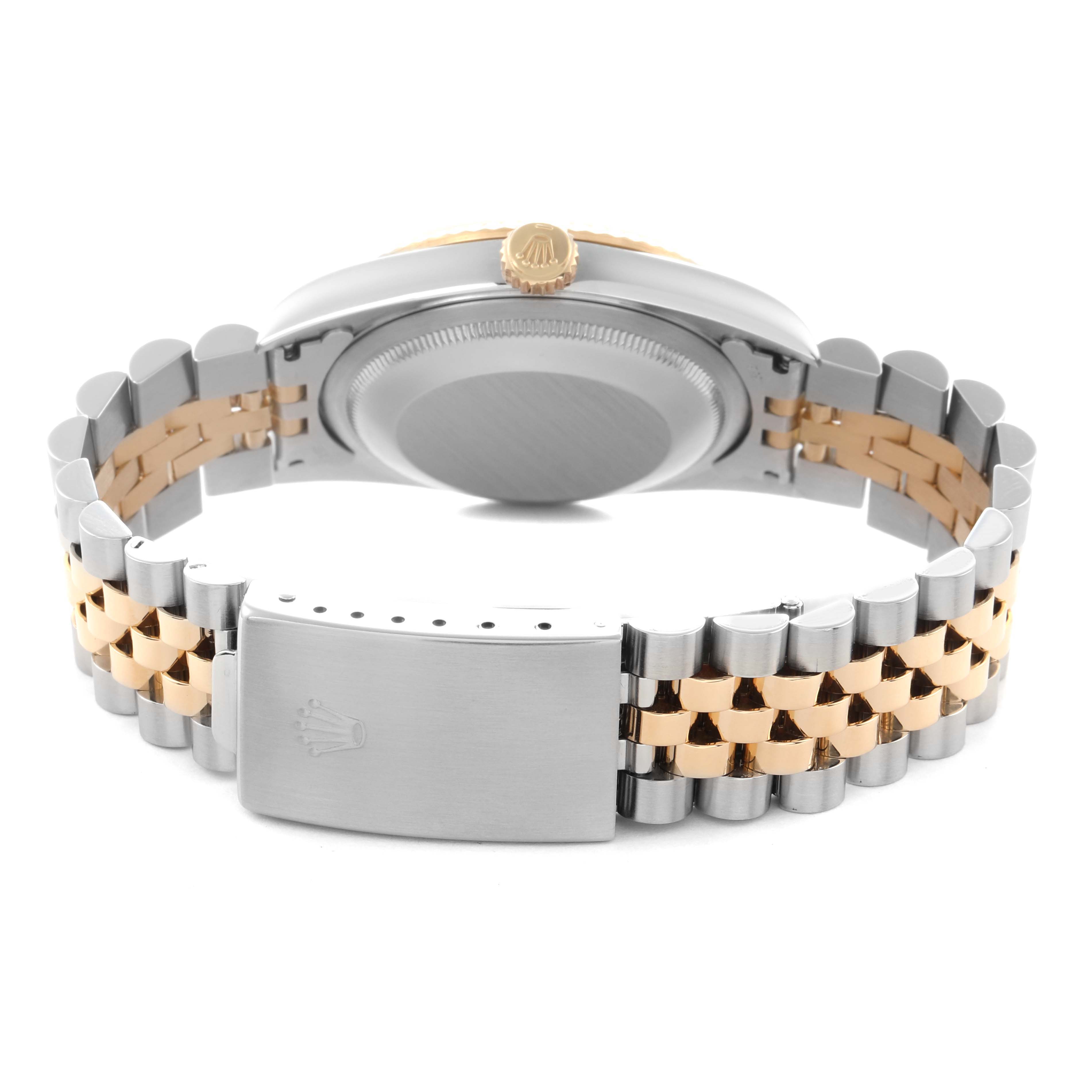The Rolex Datejust 16233 Men's Steel and Gold (two tone) Champagne Dial 16233 Men's Steel and Gold (two tone) Champagne Dial watch is shown from the back, highlighting the bracelet and the clasp with the crown logo.