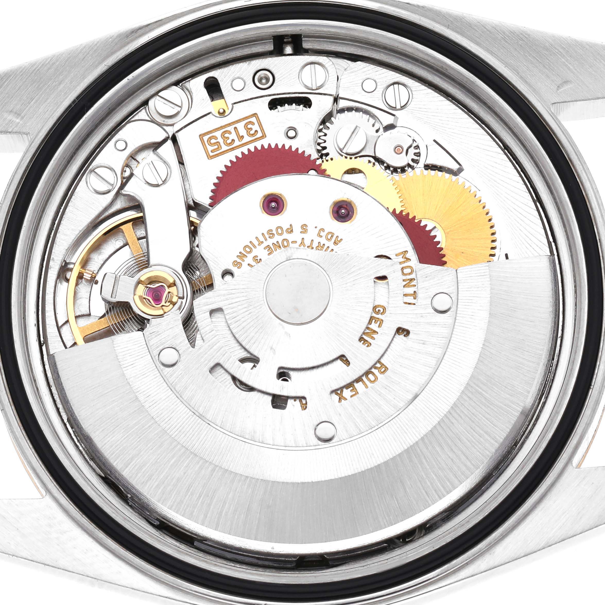 The image shows the movement mechanism of a Rolex Datejust 16233 Men's Steel and Gold (two tone) Champagne Dial 16233 Men's Steel and Gold (two tone) Champagne Dial watch, viewed from the back with visible components and gears.