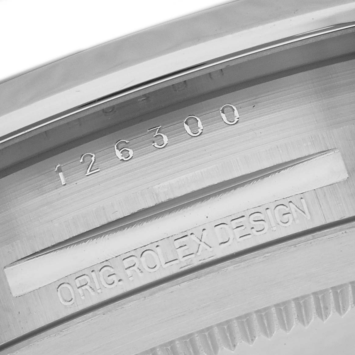 This image shows a close-up view of the model number and markings on the inner bezel of a Rolex Datejust 41 126300 Men's Stainless Steel Blue Dial 126300 Men's Stainless Steel Blue Dial watch.