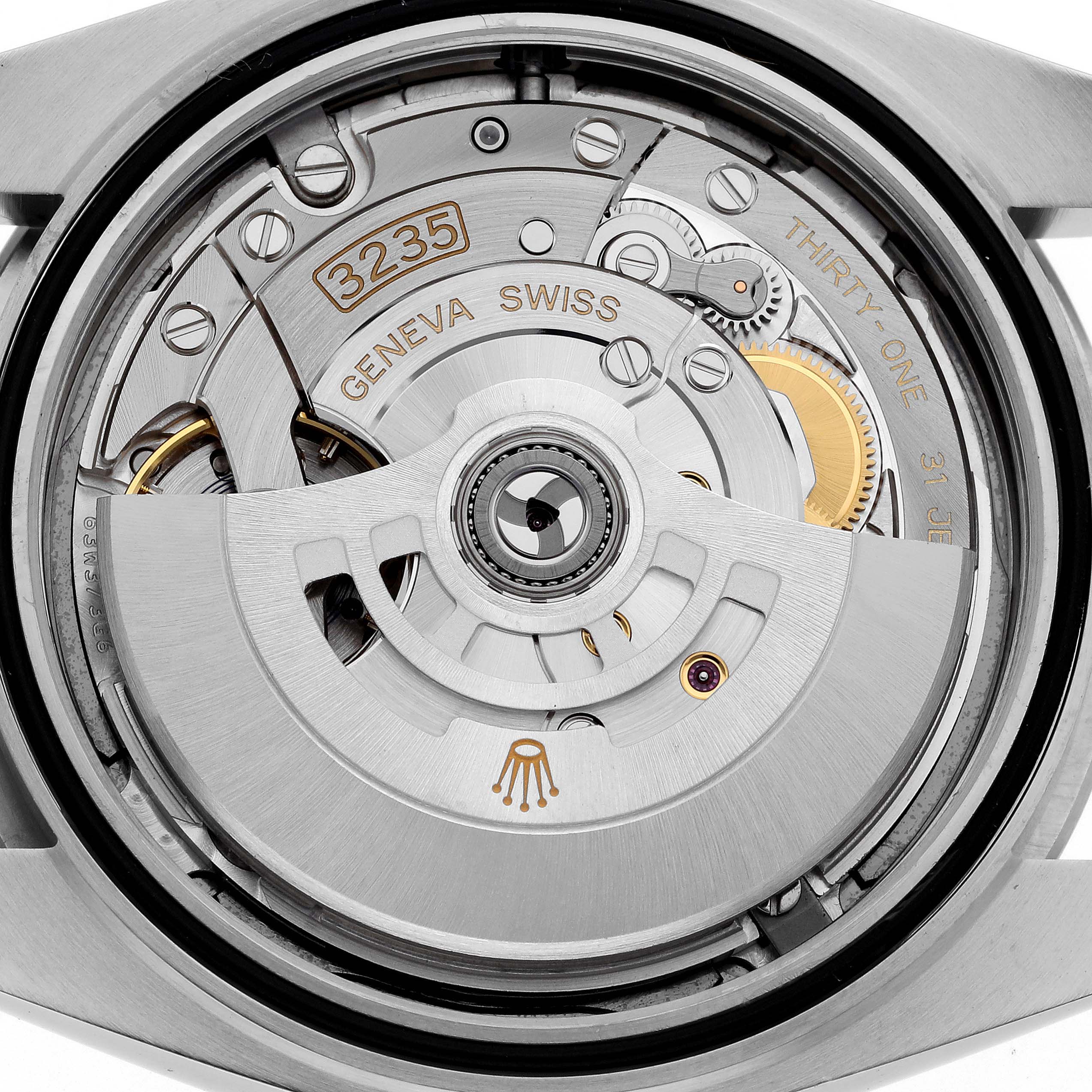 The image shows the movement and automatic rotor of the Rolex Datejust 41 126300 Men's Stainless Steel Blue Dial 126300 Men's Stainless Steel Blue Dial model, specifically the caliber 3235, in a close-up angle.