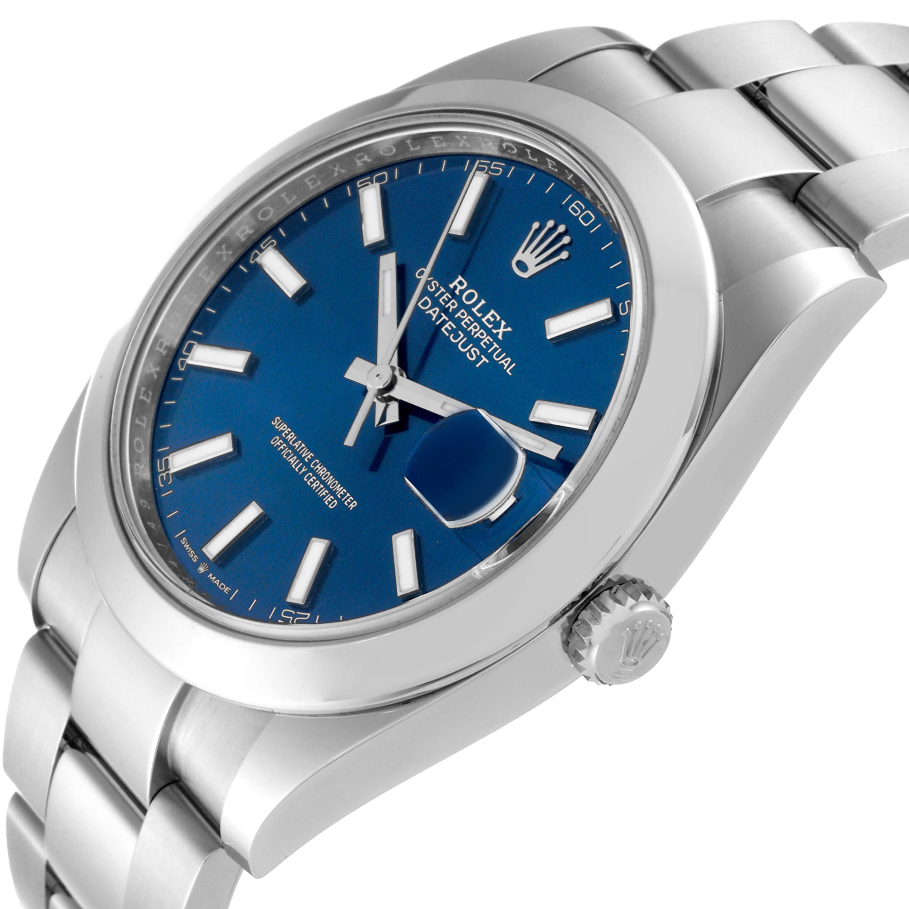 This image shows a side view of the Rolex Datejust 41 126300 Men's Stainless Steel Blue Dial 126300 Men's Stainless Steel Blue Dial watch, highlighting its blue dial, crown, bezel, and bracelet.