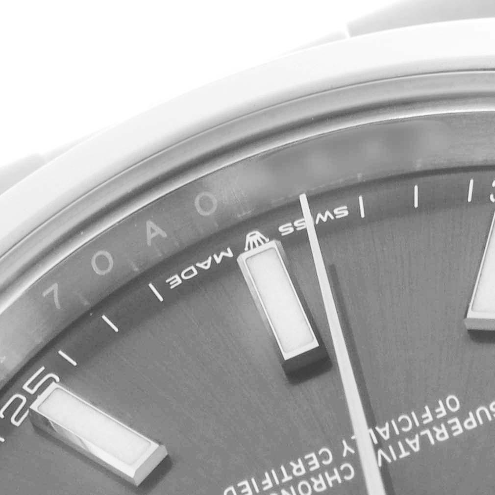 The image shows a close-up of the Rolex Datejust 41 126300 Men's Stainless Steel Grey Dial 126300 Men's Stainless Steel Grey Dial dial, focusing on the hour markers and "SWISS MADE" text.
