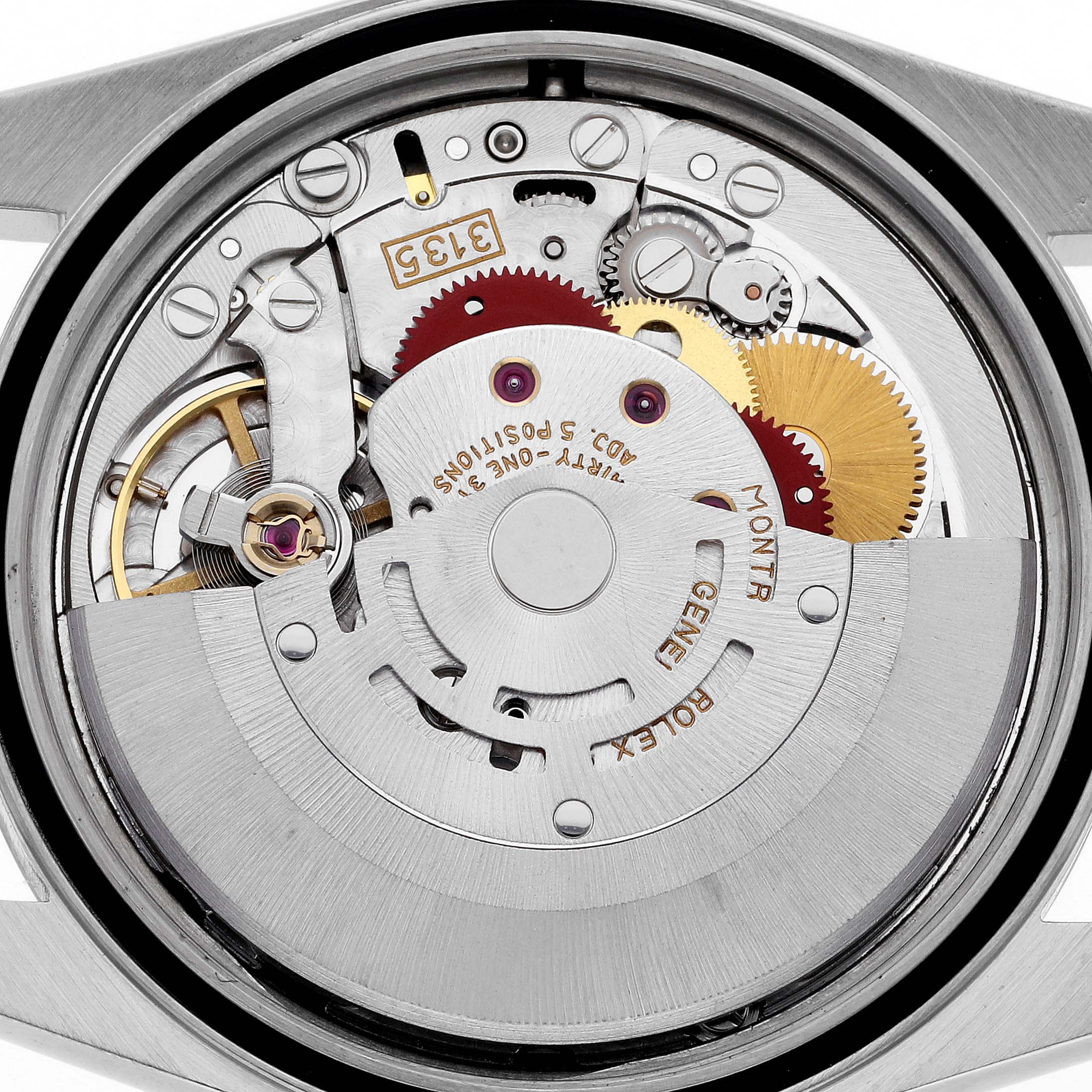 This image shows the internal movement of a Rolex Datejust 16233 Men
s Steel and Gold (two tone) Silver Dial 16233 Men
s Steel and Gold (two tone) Silver Dial watch from a top-down angle, revealing gears and mechanical parts.