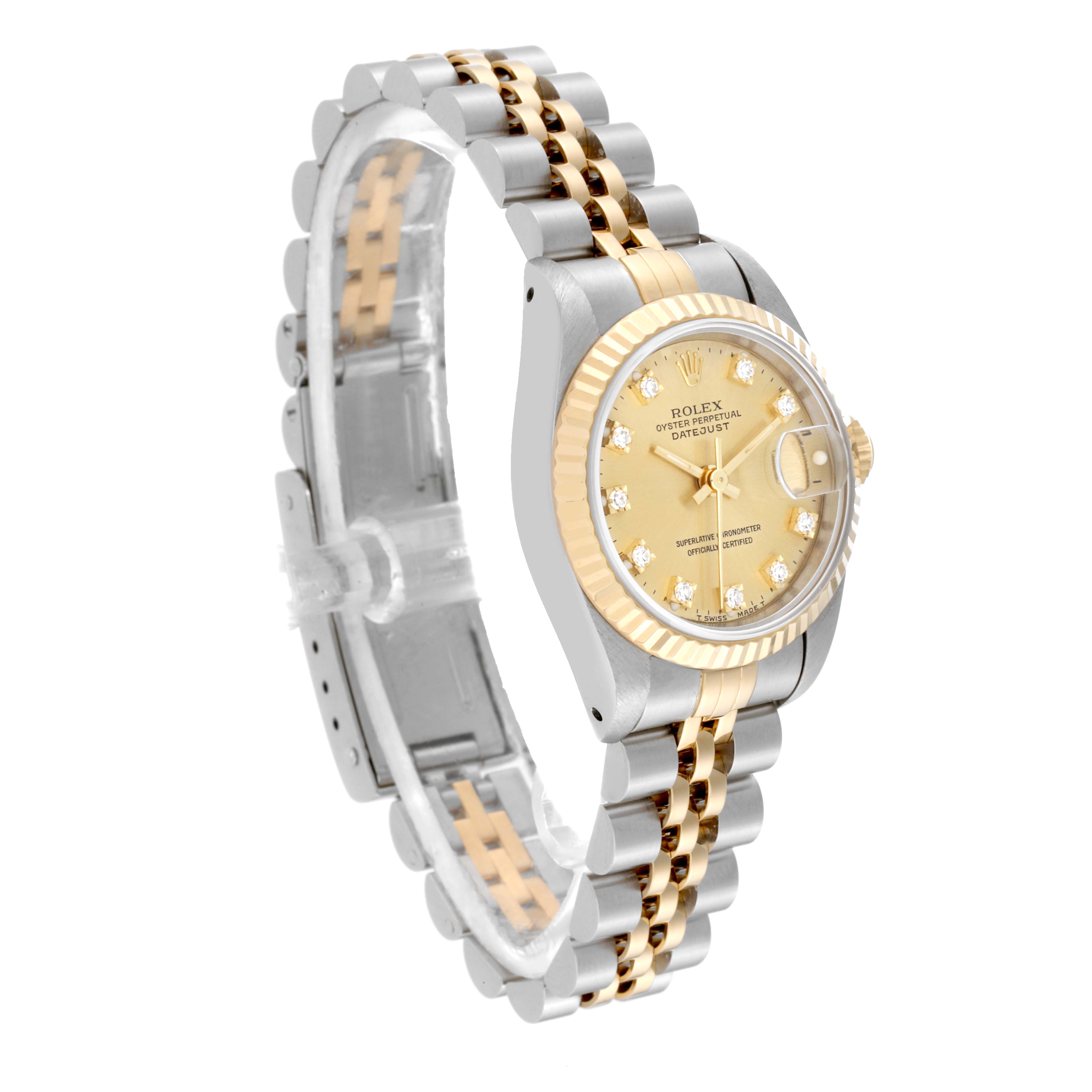 The Rolex Datejust 69173 Women's Steel and Gold (two tone) Champagne Dial 69173 Women's Steel and Gold (two tone) Champagne Dial watch is shown at an angle showcasing the dial, fluted bezel, and jubilee bracelet.