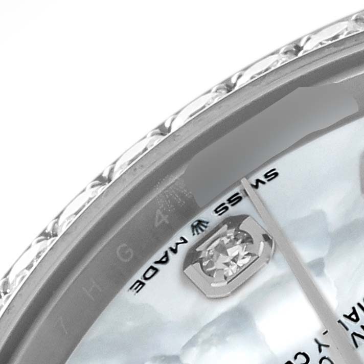 The image shows a close-up of the dial, diamond hour marker, and bezel of a Rolex Mid-Size 278384 Women's Stainless Steel Mother of Pearl Dial 278384 Women's Stainless Steel Mother of Pearl Dial model watch.