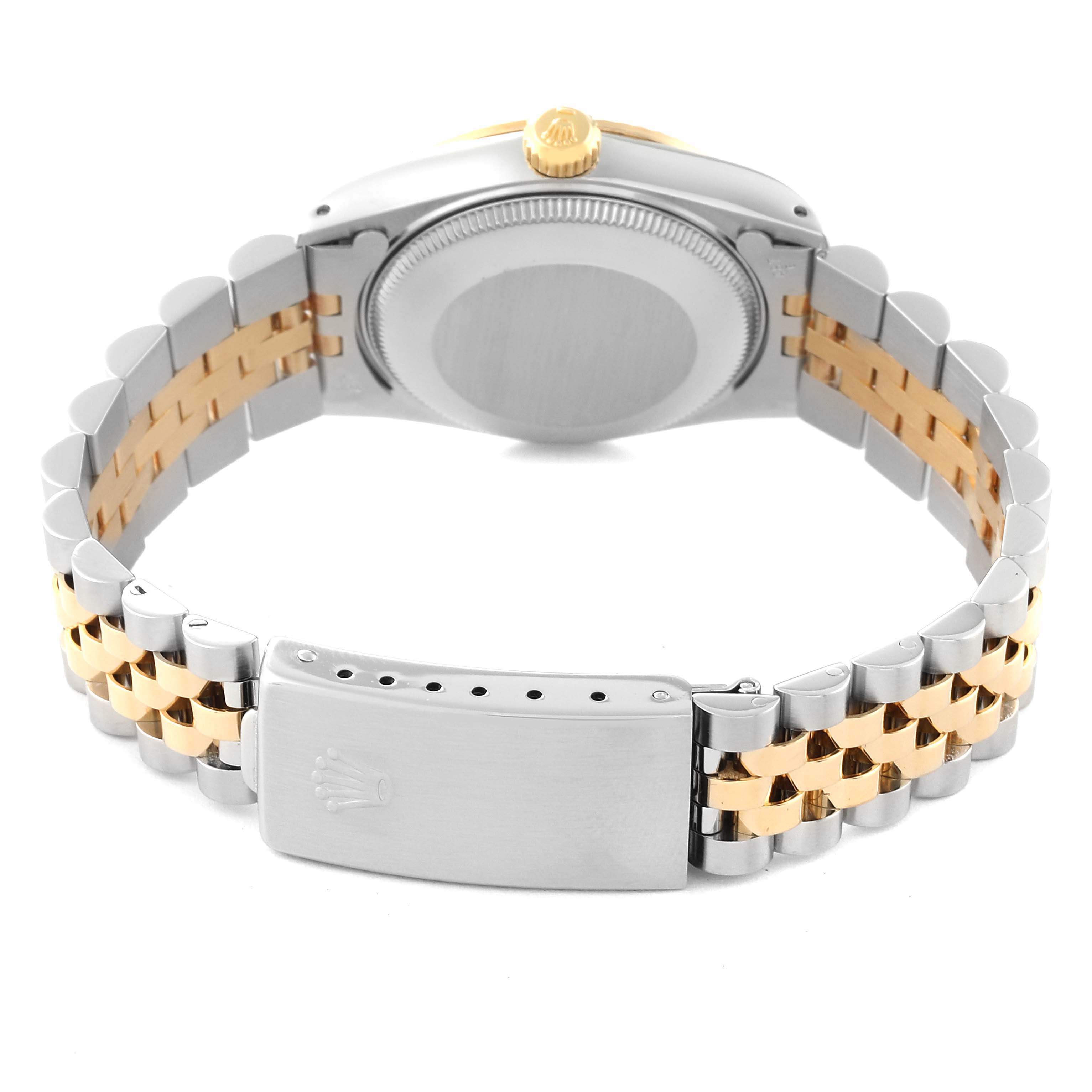 This image shows the back of a Rolex Mid-Size 68273 Women's Steel and Gold (two tone) Champagne Dial 68273 Women's Steel and Gold (two tone) Champagne Dial model watch, highlighting its two-tone bracelet and clasp.