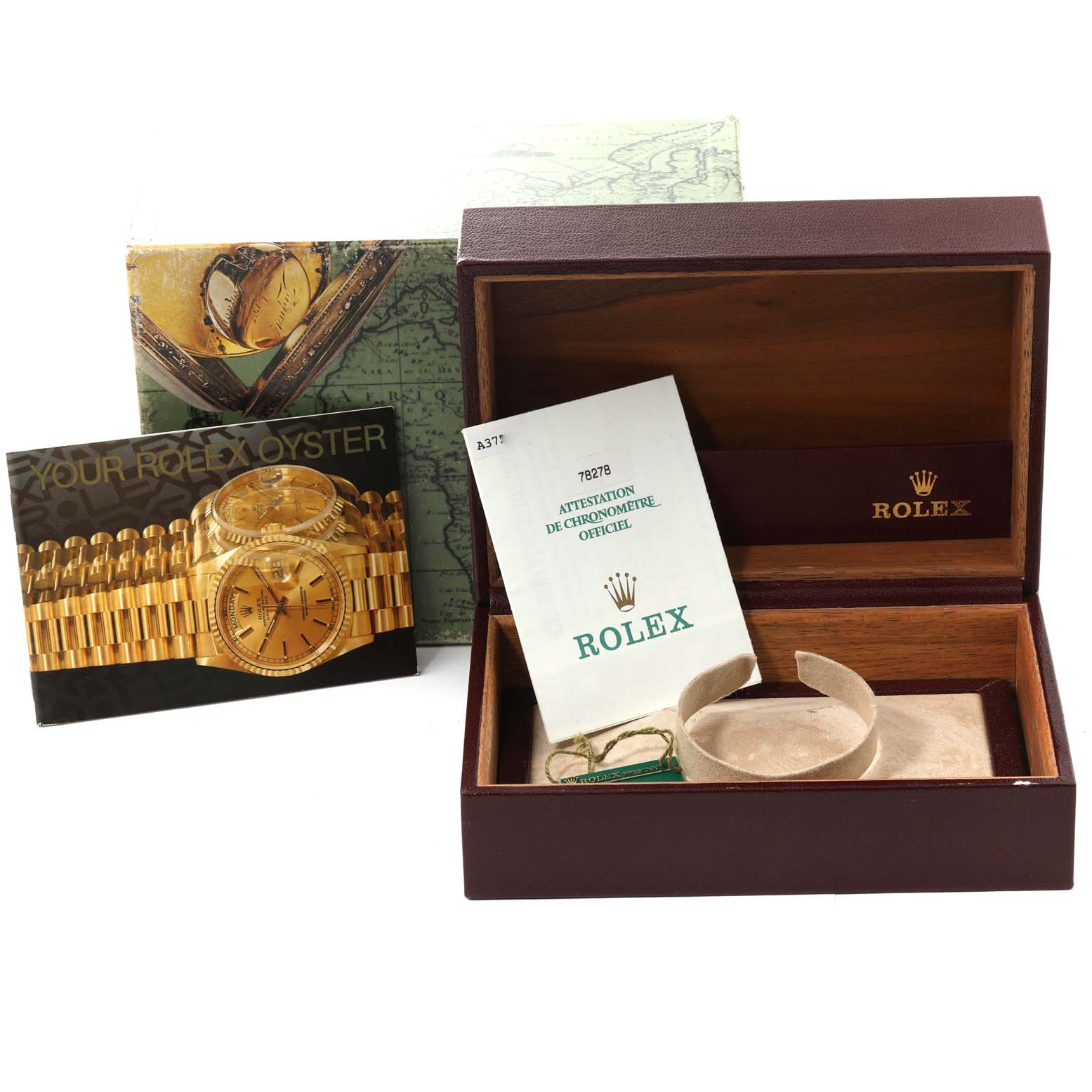 The image shows a Rolex President 78278 Women's Yellow Gold Champagne Dial 78278 Women's Yellow Gold Champagne Dial model watch box and accessories, including manuals and a tag, from a straight-on angle.