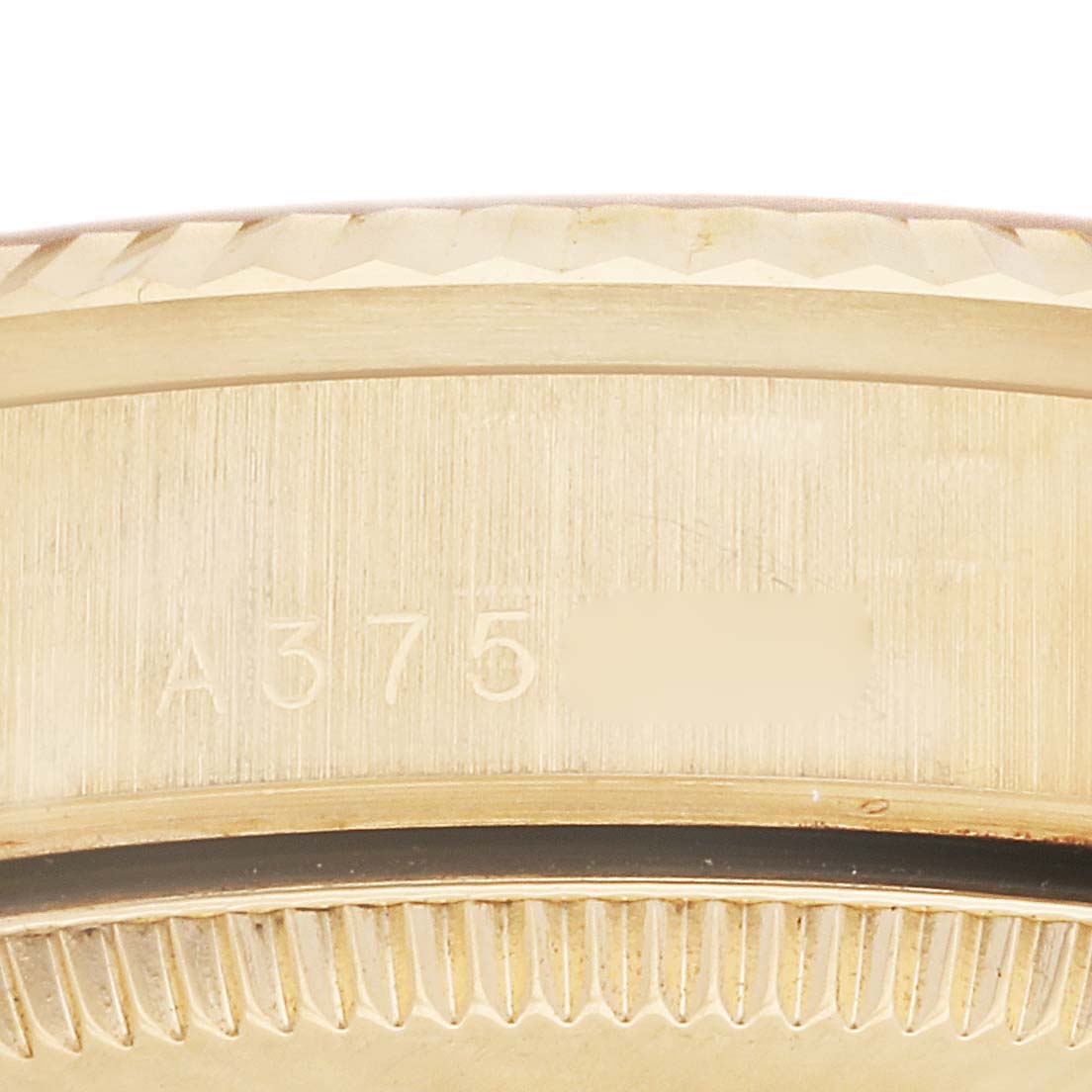 This close-up image shows the case side and engravings of a Rolex President 78278 Women's Yellow Gold Champagne Dial 78278 Women's Yellow Gold Champagne Dial model watch.