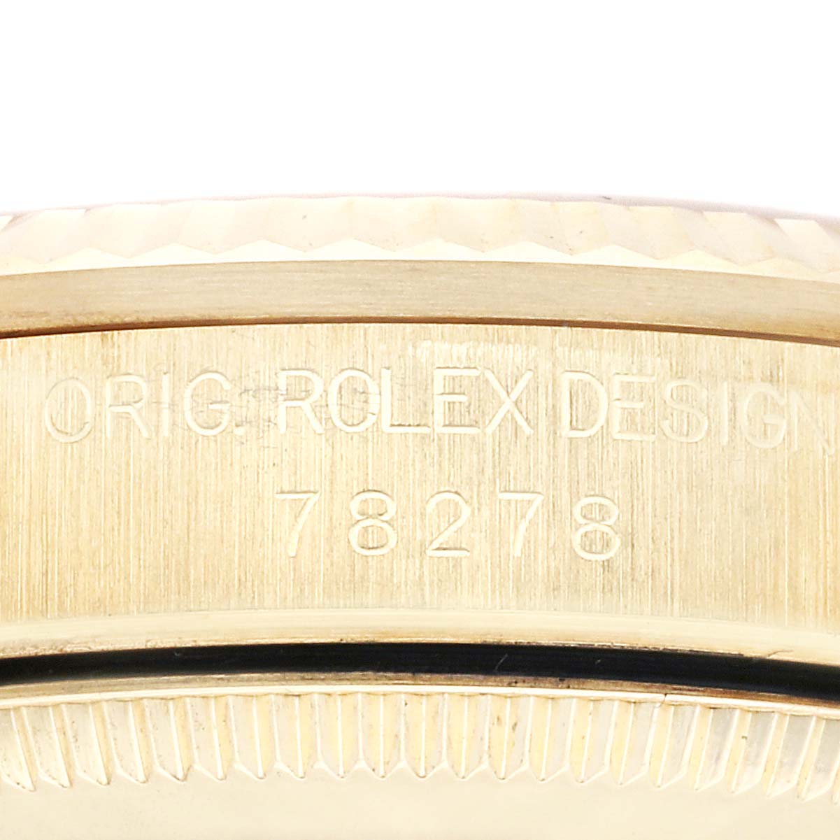 This close-up image shows the stamped reference number on the case of a Rolex President 78278 Women's Yellow Gold Champagne Dial 78278 Women's Yellow Gold Champagne Dial model watch.