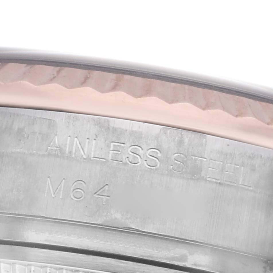 The image shows a close-up of the stainless steel back and bezel edge of a Rolex Datejust 179171 Women's Steel and Gold (two tone) White Dial 179171 Women's Steel and Gold (two tone) White Dial watch.