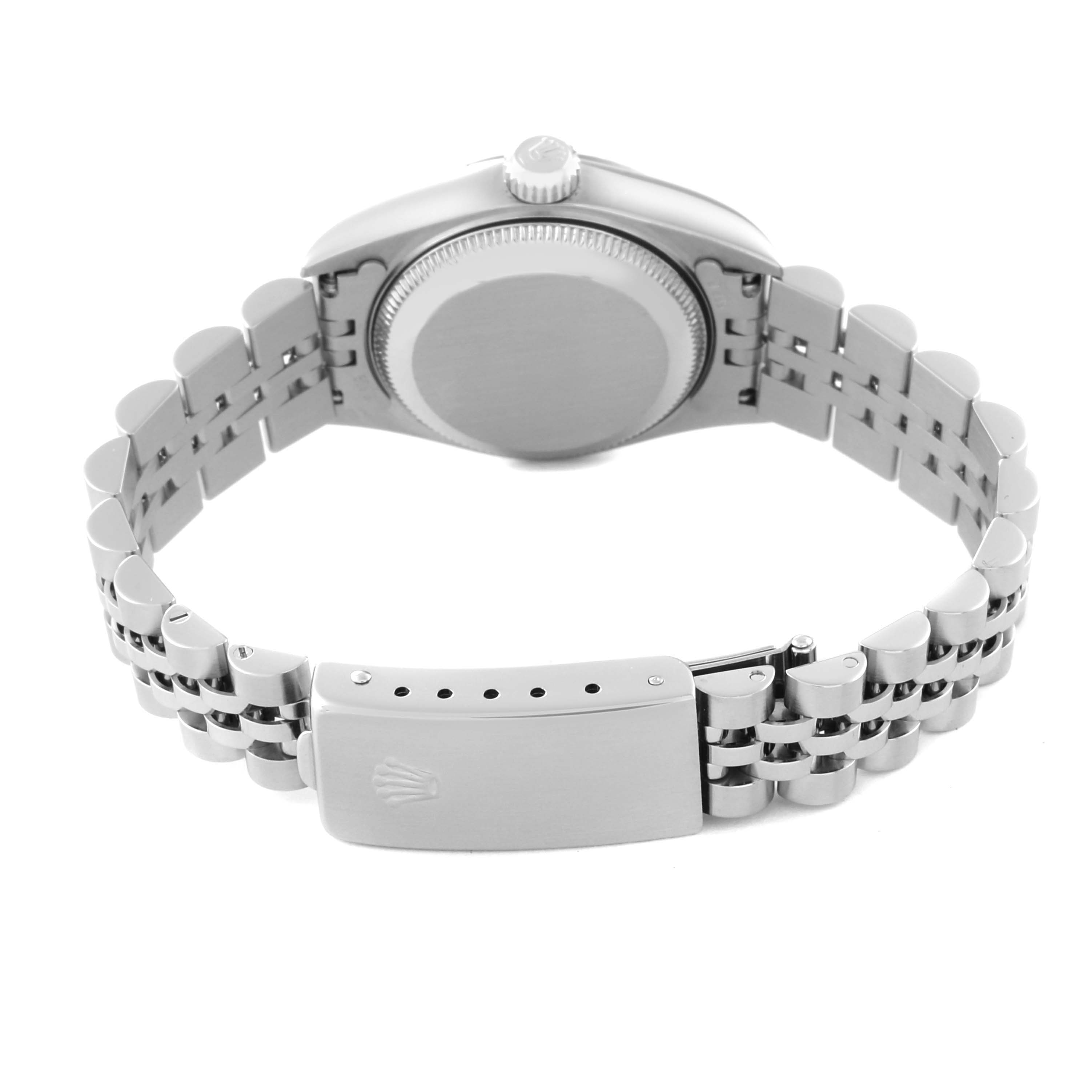 The image shows the back view of a Rolex Datejust 79174 Women's Stainless Steel Blue Dial 79174 Women's Stainless Steel Blue Dial watch, highlighting the caseback, crown, and bracelet with the clasp.