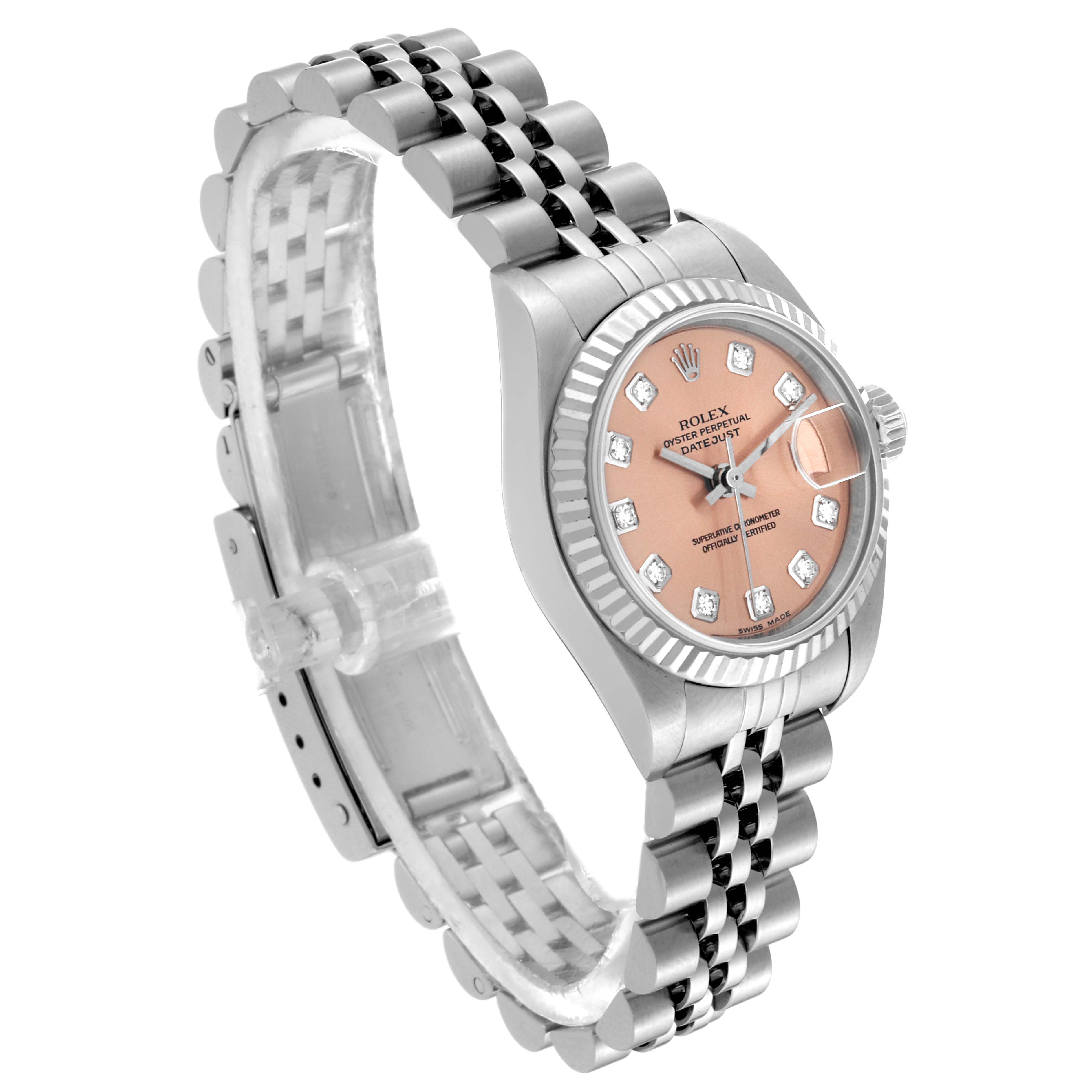 The Rolex Datejust 79174 Women's Stainless Steel Pink Dial 79174 Women's Stainless Steel Pink Dial watch is shown at an angle, highlighting its pink dial, diamond markers, fluted bezel, and Jubilee bracelet.