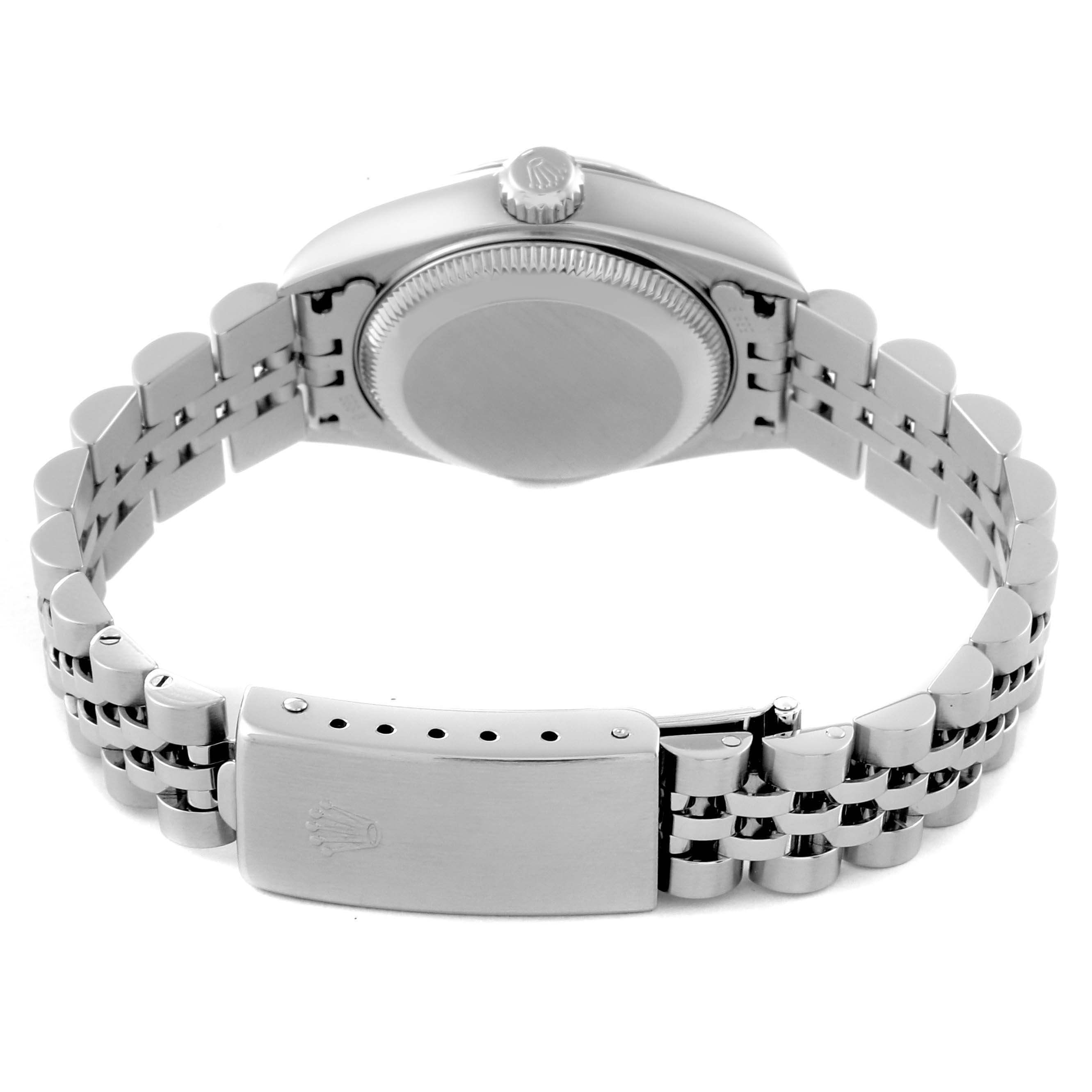 The image shows the backside and clasp of a Rolex Datejust 79174 Women's Stainless Steel Pink Dial 79174 Women's Stainless Steel Pink Dial watch, highlighting its bracelet and crown.