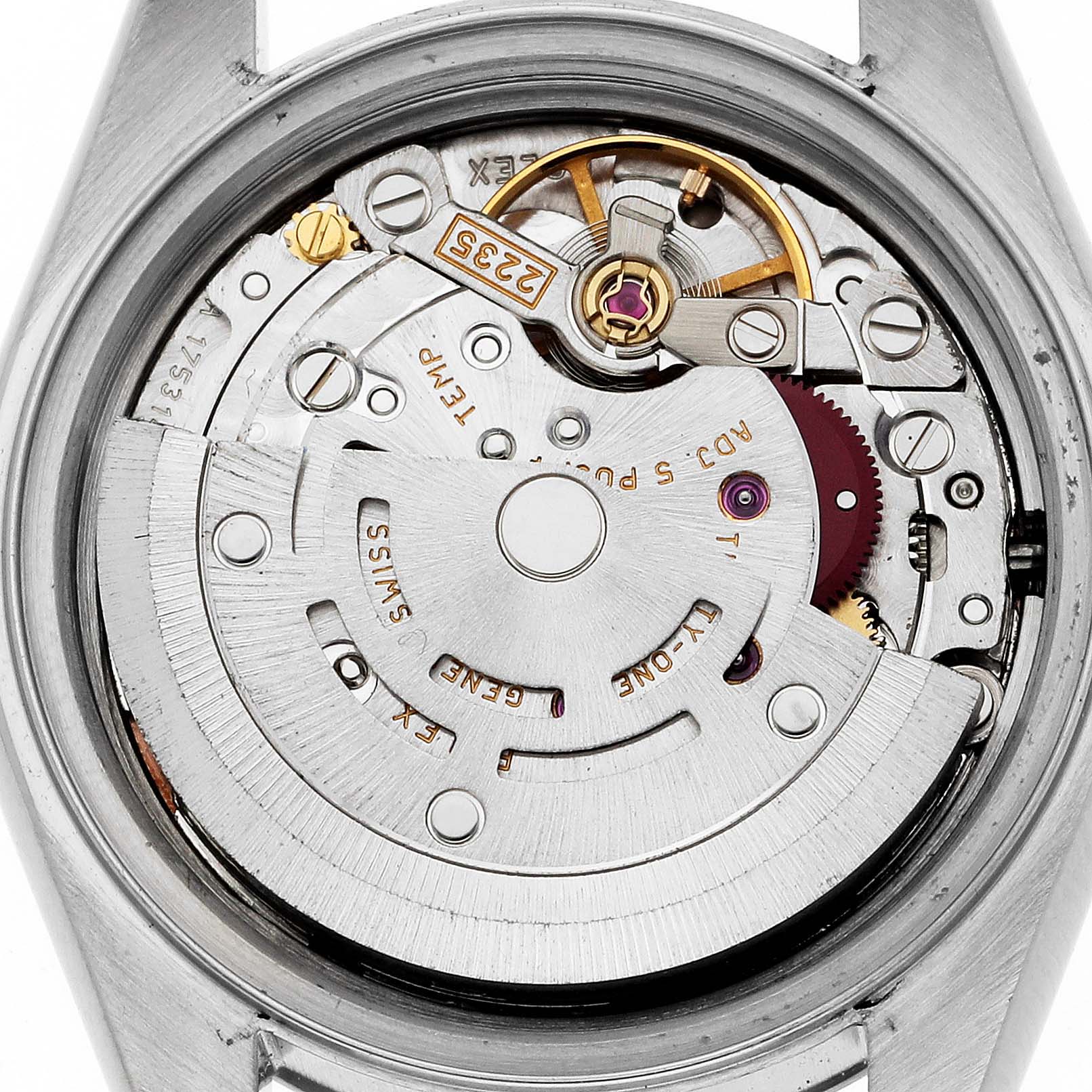 This image shows the inner workings and movement of a Rolex Datejust 79174 Women's Stainless Steel Pink Dial 79174 Women's Stainless Steel Pink Dial watch from a rear view.