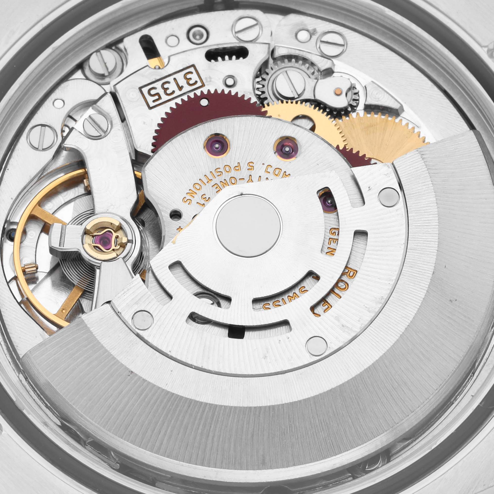 The image shows an up-close view of the movement mechanism inside a Rolex Datejust 116234 Men's Stainless Steel White Dial 116234 Men's Stainless Steel White Dial watch, highlighting gears and intricate parts.