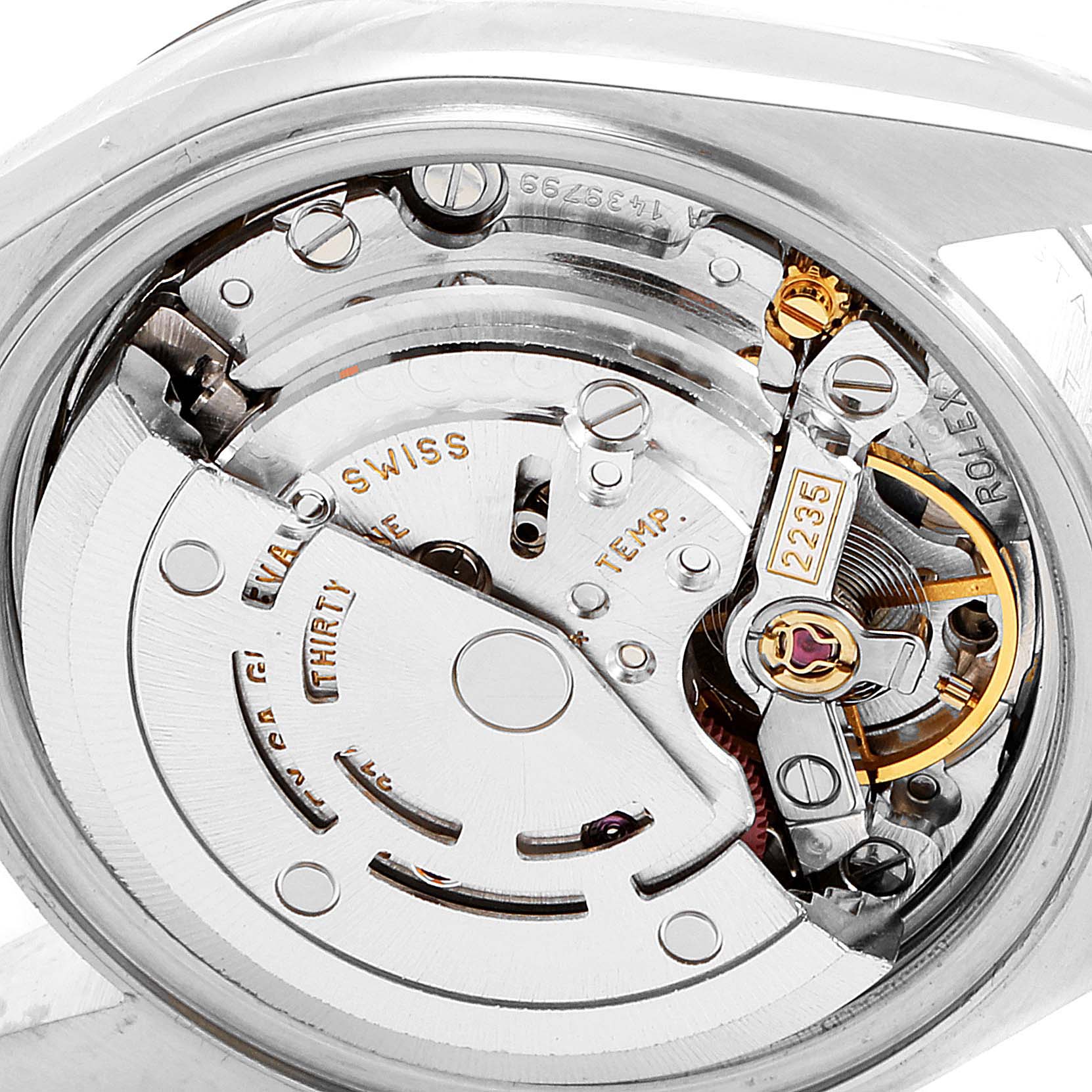 The image shows the inner mechanical movement of a Rolex Datejust 79174 Women
s Stainless Steel Mother of Pearl Dial 79174 Women
s Stainless Steel Mother of Pearl Dial watch from a close-up, showcasing its intricate components.