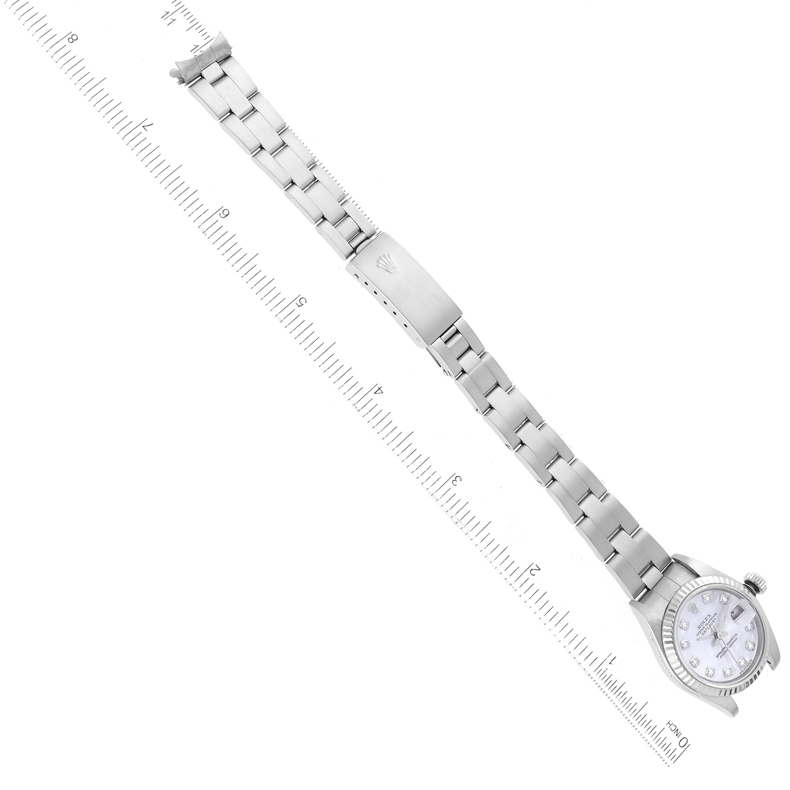 This image shows a Rolex Datejust 79174 Women's Stainless Steel Mother of Pearl Dial 79174 Women's Stainless Steel Mother of Pearl Dial watch at a diagonal angle, displaying the full bracelet, clasp, and watch face.