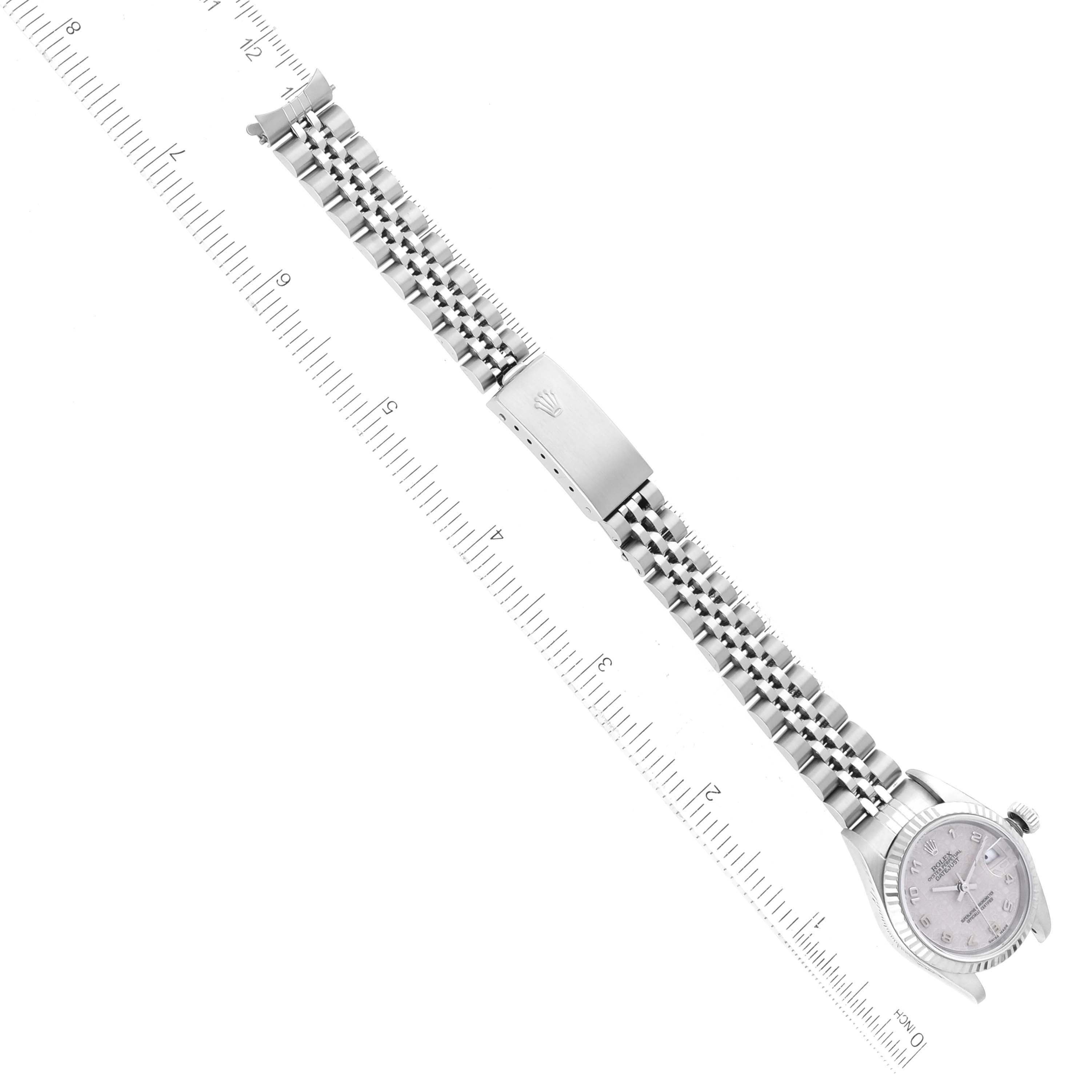 This image shows the top view of the Rolex Datejust 79174 Women's Stainless Steel Silver Dial 79174 Women's Stainless Steel Silver Dial watch, including its jubilee bracelet and clasp.