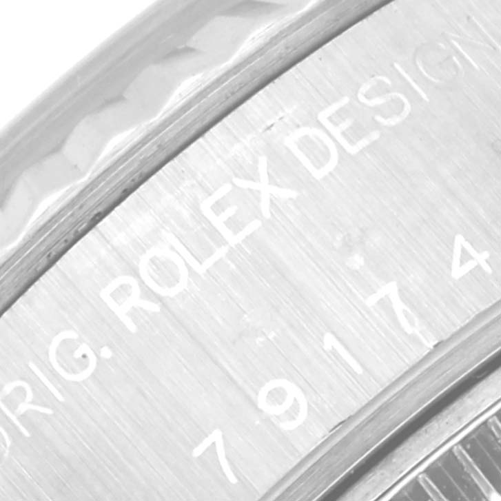 The image shows a close-up of the case back with "ORIG. ROLEX DESIGN" engraving on the Rolex Datejust 79174 Women's Stainless Steel Silver Dial 79174 Women's Stainless Steel Silver Dial model.