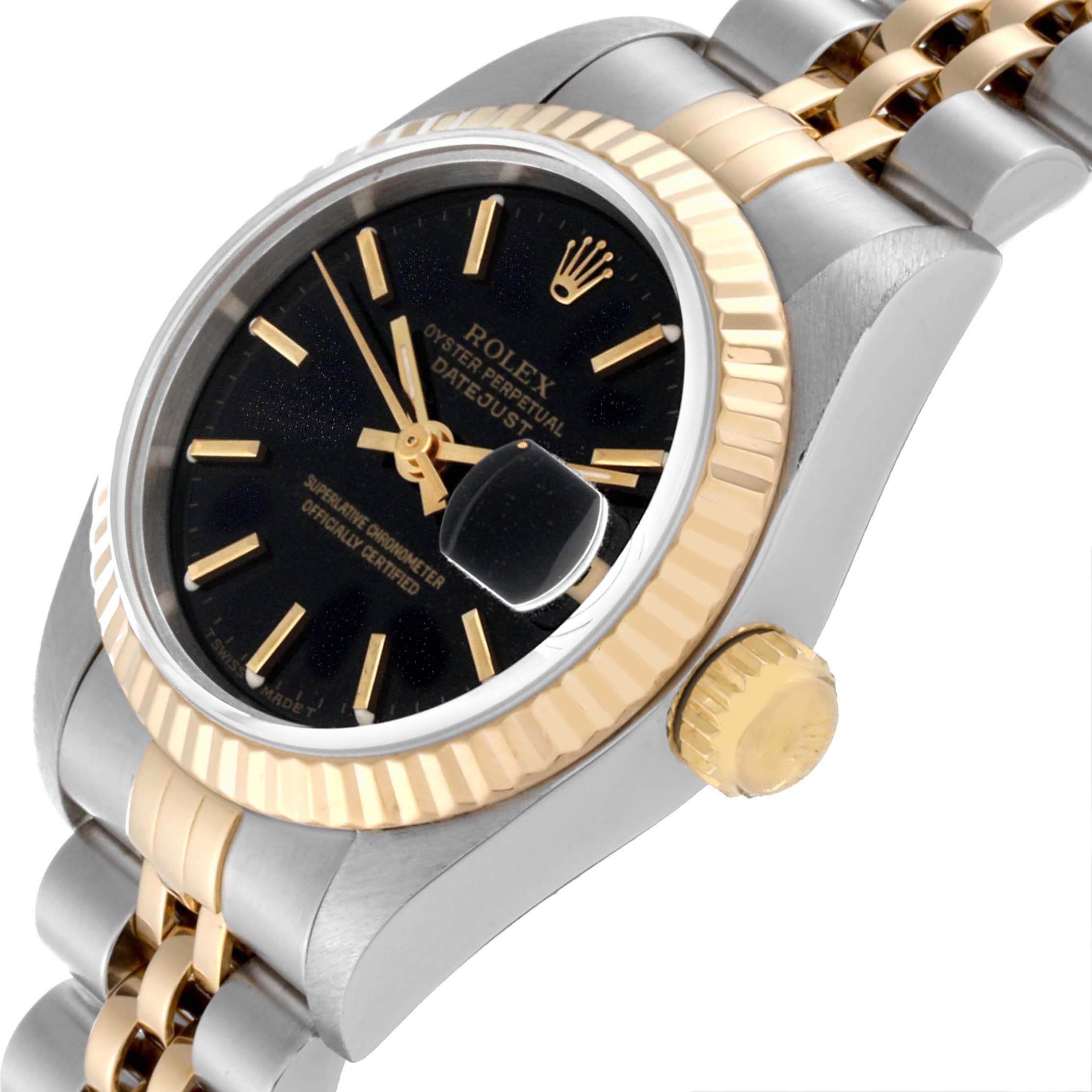 The image shows a close-up, angled view of the Rolex Datejust 69173 Women's Steel and Gold (two tone) Black Dial 69173 Women's Steel and Gold (two tone) Black Dial watch, highlighting the crown, bezel, and bracelet.