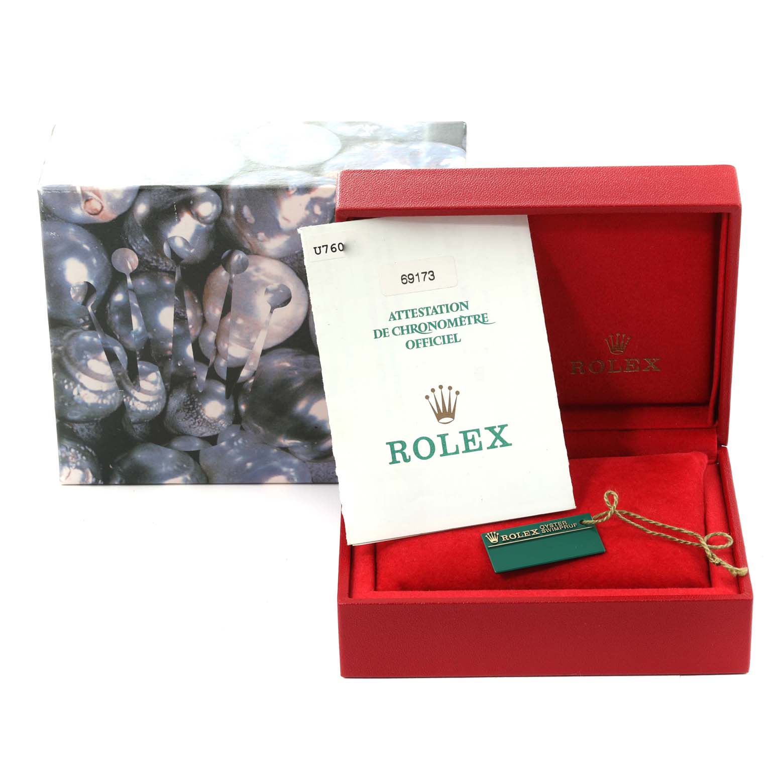 This image shows a Rolex Datejust 69173 Women's Steel and Gold (two tone) Black Dial 69173 Women's Steel and Gold (two tone) Black Dial watch box, certification papers, and a tag, viewed from the top front angle.