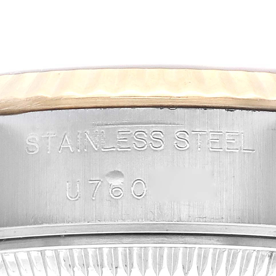 This image shows a close-up of the stainless steel side of the Rolex Datejust 69173 Women's Steel and Gold (two tone) Black Dial 69173 Women's Steel and Gold (two tone) Black Dial with part of the serial number visible.