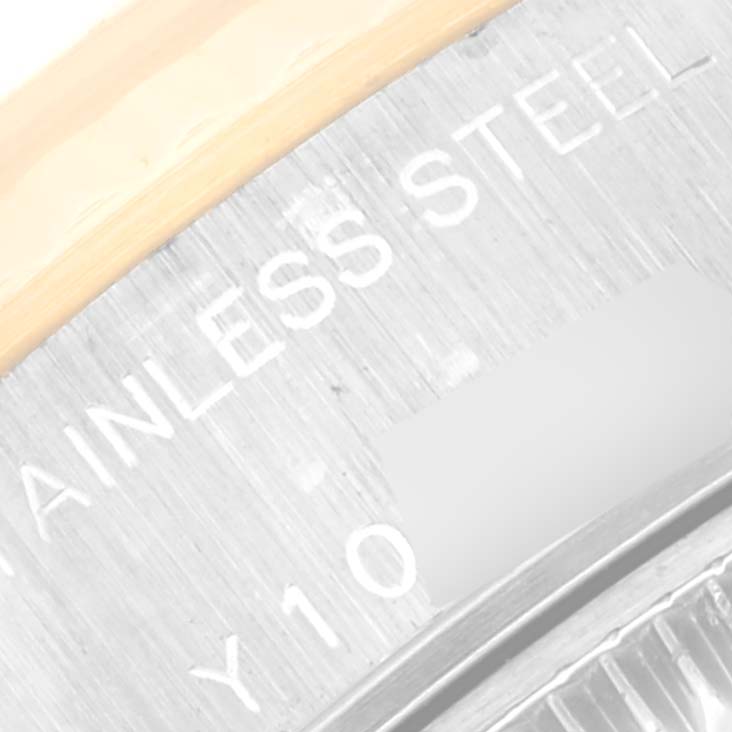 The image shows a close-up of the case back of a Rolex Datejust 79173 Women's Steel and Gold (two tone) Champagne Dial 79173 Women's Steel and Gold (two tone) Champagne Dial watch, highlighting the text "STAINLESS STEEL".