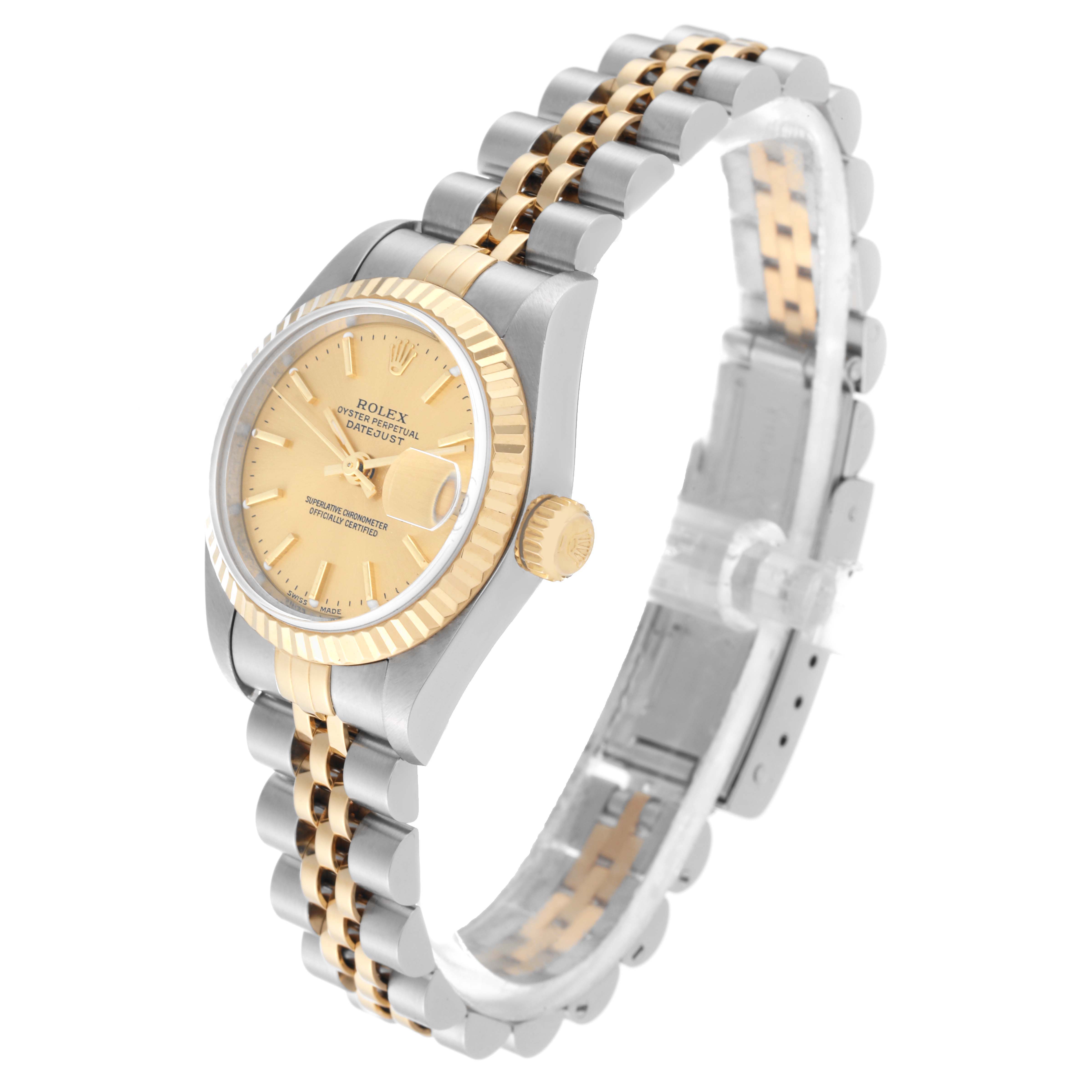 The image shows a Rolex Datejust 79173 Women's Steel and Gold (two tone) Champagne Dial 79173 Women's Steel and Gold (two tone) Champagne Dial watch from an angled side view, highlighting its dial, bezel, crown, and bracelet.