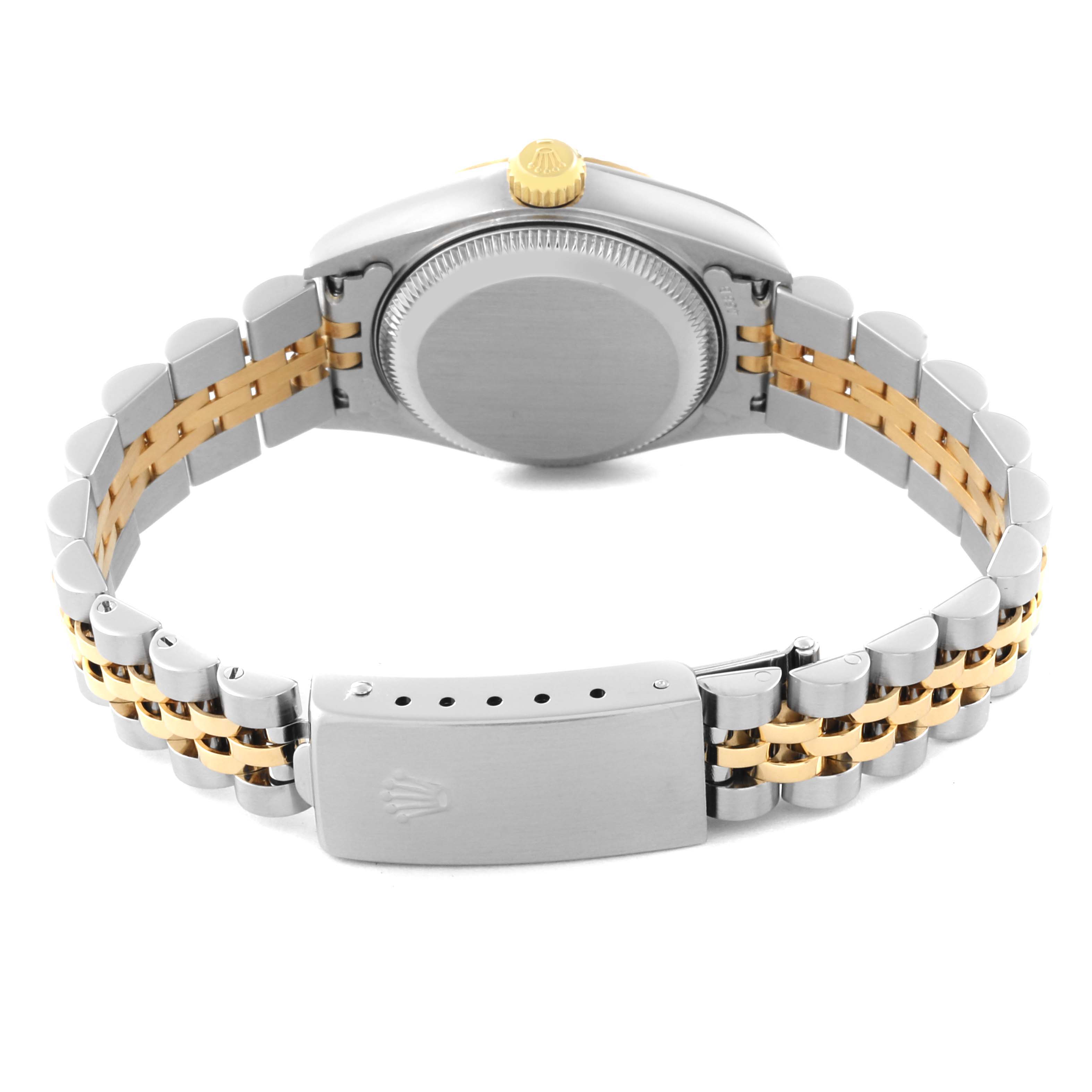 This image shows the back view of a Rolex Datejust 79173 Women's Steel and Gold (two tone) Champagne Dial 79173 Women's Steel and Gold (two tone) Champagne Dial watch, highlighting its two-tone bracelet and clasp.