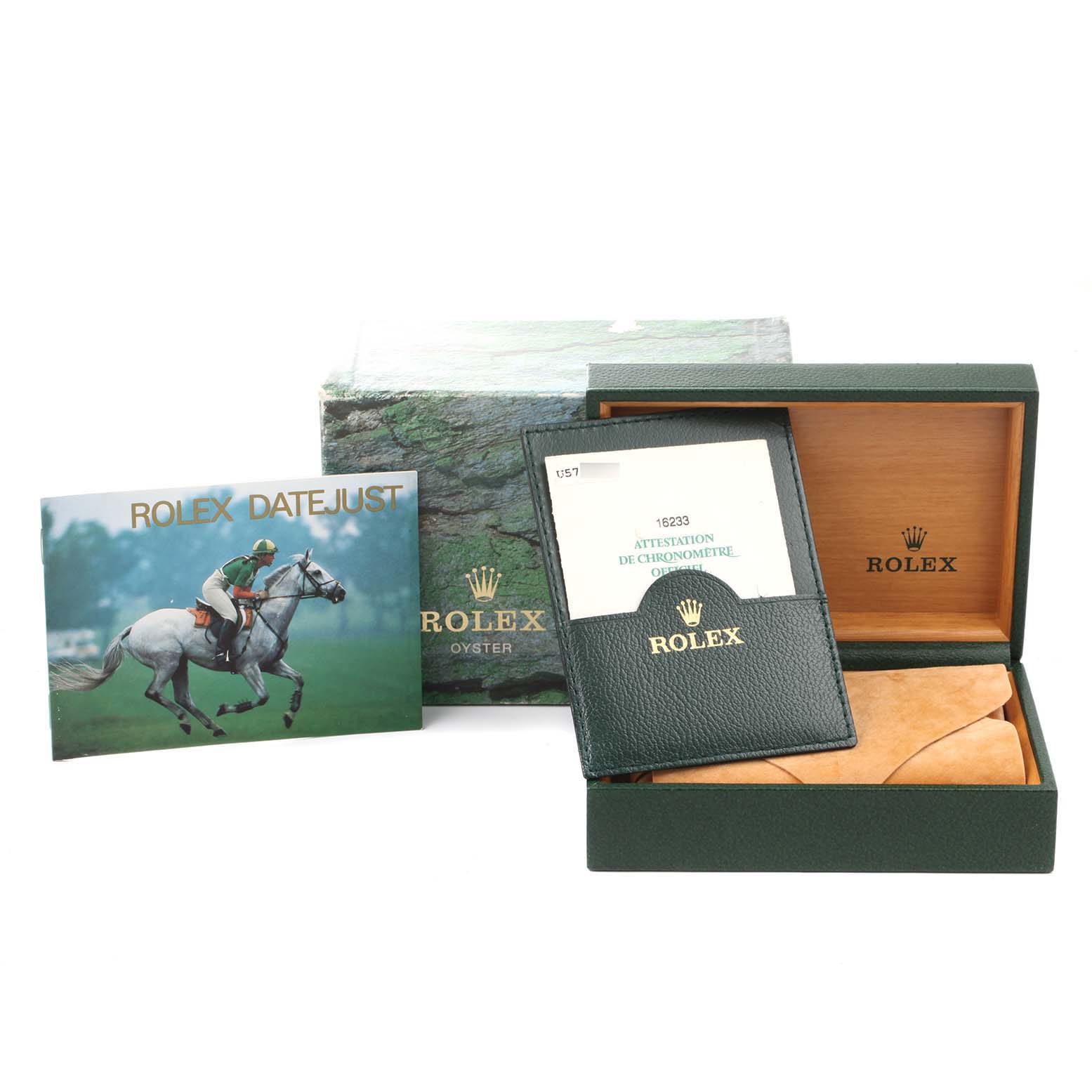 The image shows accessories for the Rolex Datejust 16233 Men's Steel and Gold (two tone) Champagne Dial 16233 Men's Steel and Gold (two tone) Champagne Dial model, including the branded box, booklet, warranty card holder, and a case.