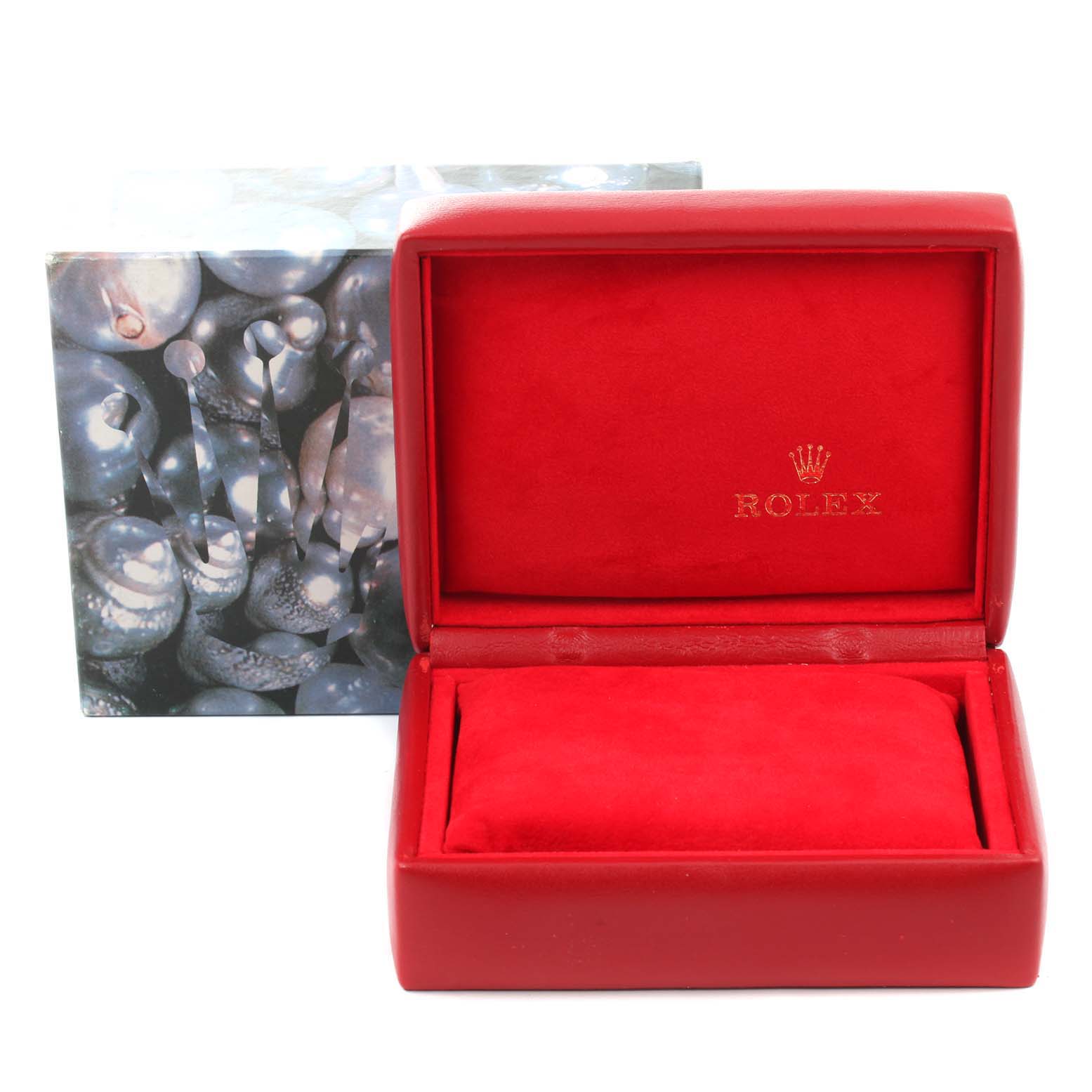 The image shows a red Rolex Datejust 79173 Women
s Steel and Gold (two tone) Silver Dial 79173 Women
s Steel and Gold (two tone) Silver Dial watch box, viewed from the front with its lid open, displaying the cushioned interior.