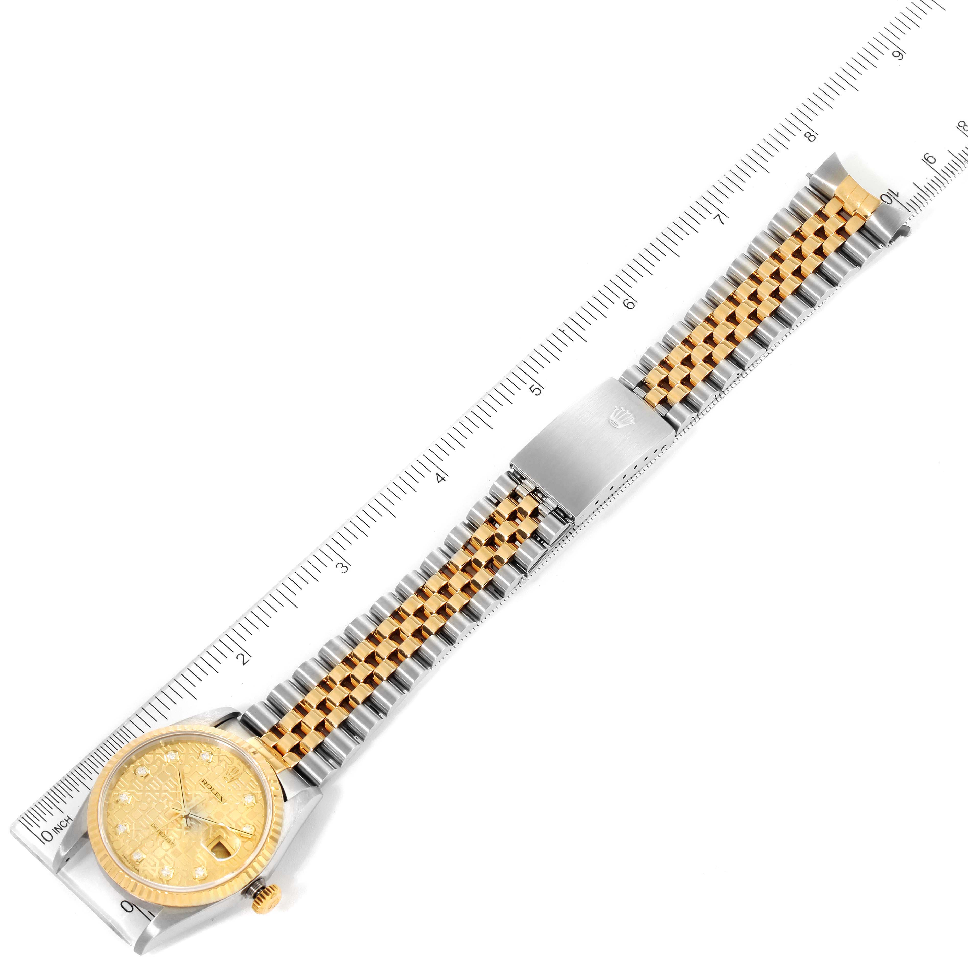 This image shows a Rolex Datejust 16233 Men's Steel and Gold (two tone) Champagne Dial 16233 Men's Steel and Gold (two tone) Champagne Dial watch laid flat with the entire bracelet and dial visible, measured against a ruler.