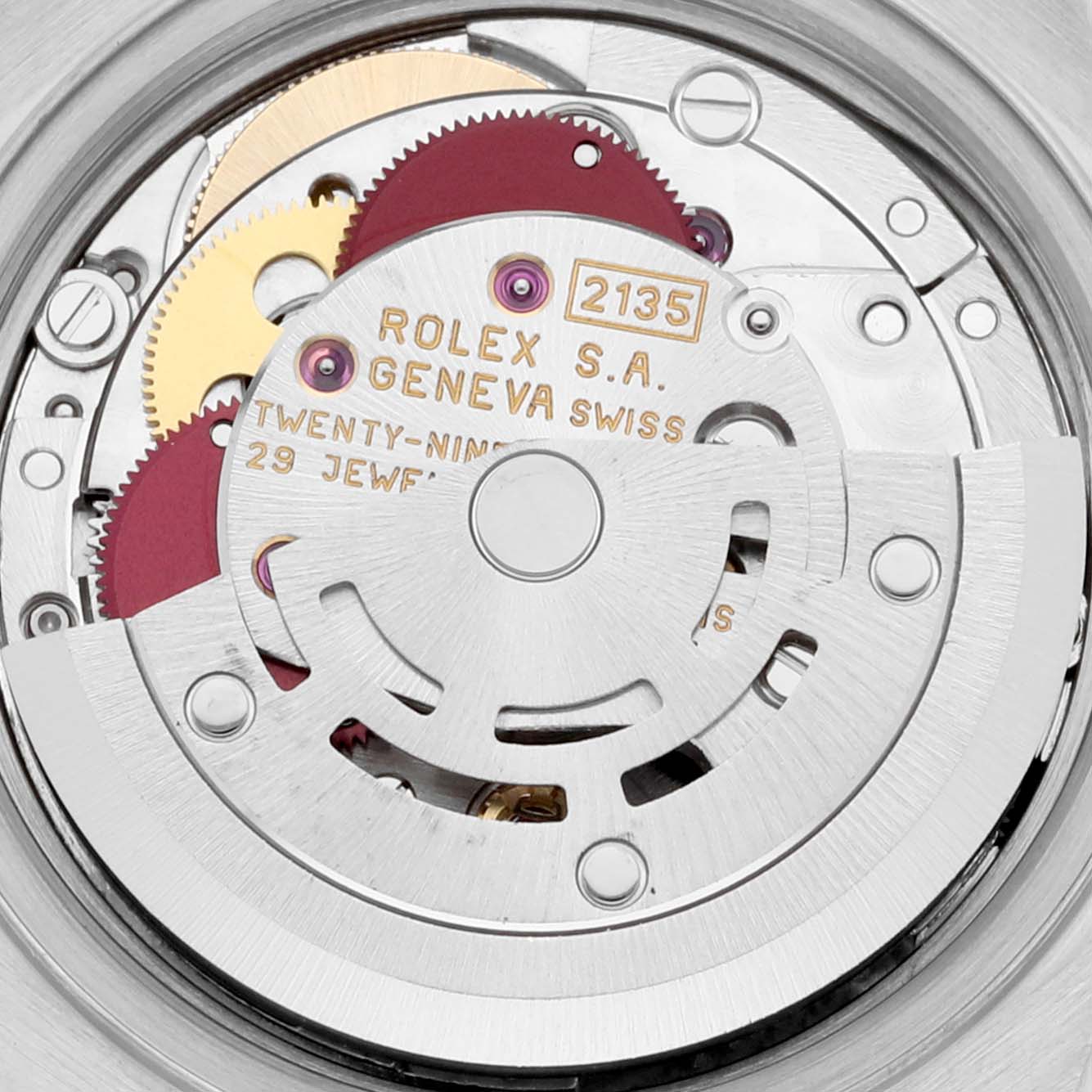 The image shows the internal movement mechanism of a Rolex Datejust 69173 Women's Steel and Gold (two tone) Mother of Pearl Dial 69173 Women's Steel and Gold (two tone) Mother of Pearl Dial model watch, highlighting intricate gears and components.