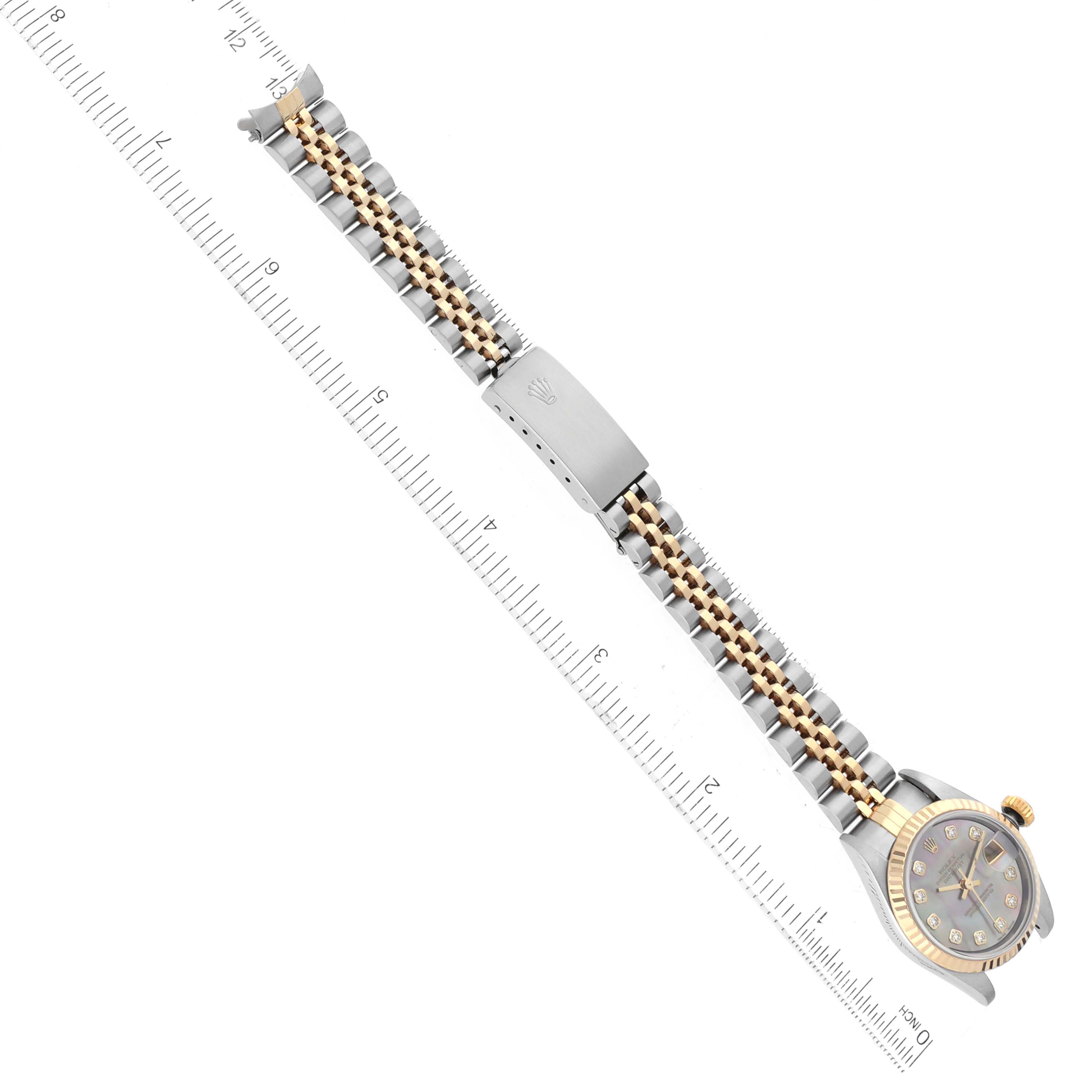 This image shows a top-down view of a Rolex Datejust 69173 Women's Steel and Gold (two tone) Mother of Pearl Dial 69173 Women's Steel and Gold (two tone) Mother of Pearl Dial watch, highlighting its bracelet, clasp, dial, and crown.