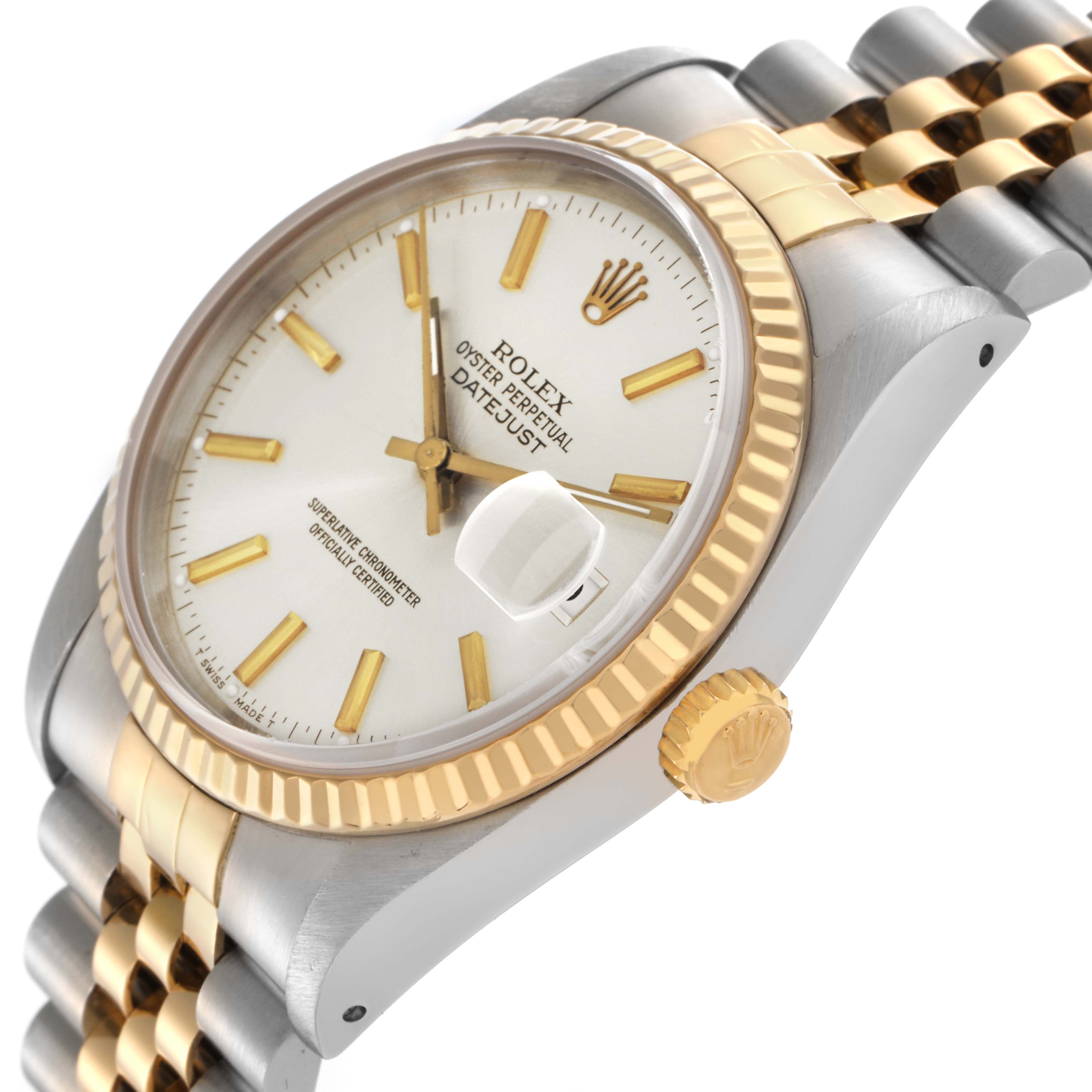 The Rolex Datejust 16233 Men's Steel and Gold (two tone) Silver Dial 16233 Men's Steel and Gold (two tone) Silver Dial watch is shown at an angled view, highlighting the dial, fluted bezel, and jubilee bracelet.